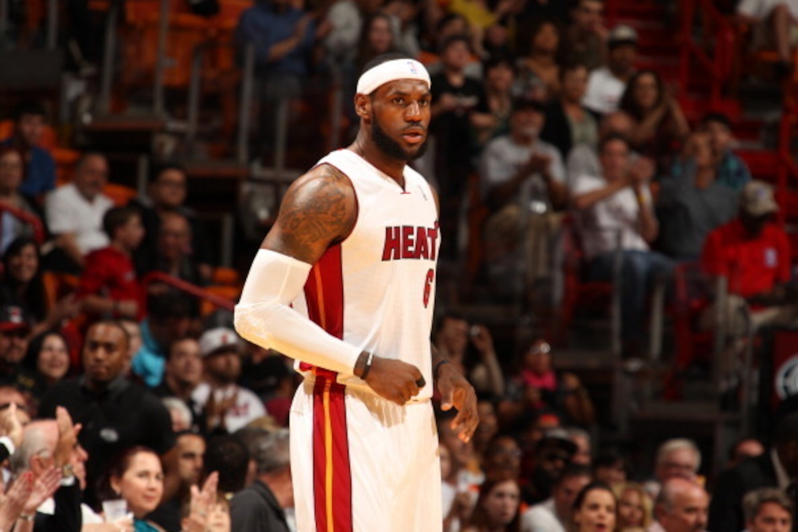 MIAMI, FL - March 10: LeBron James #6 of the Miami Heat looks on against the Washington Wizards at the American Airlines Arena in Miami, Florida on March 10 2014. NOTE TO USER: User expressly acknowledges and agrees that, by downloading and/or using this 