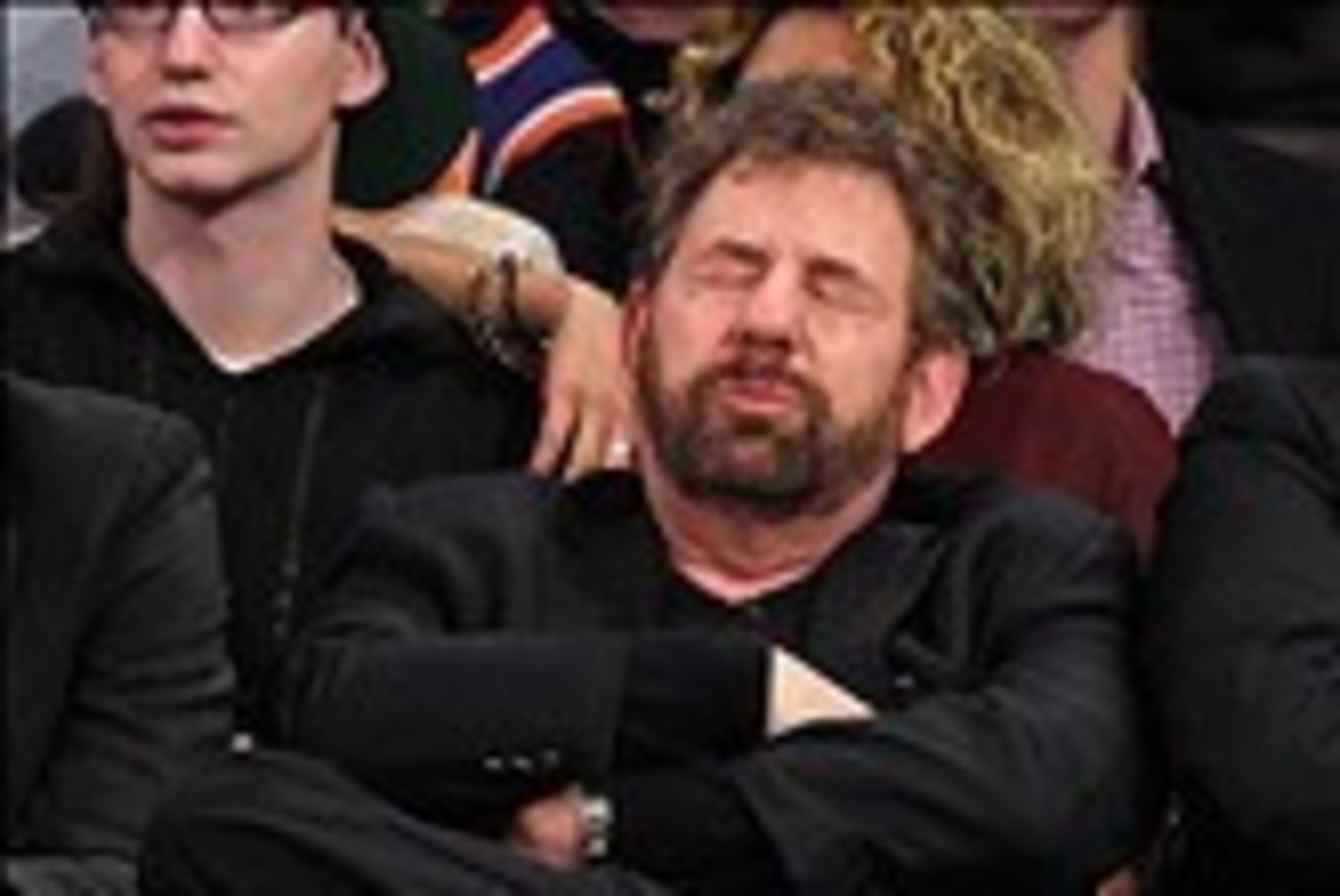 Dec 25, 2013; New York, NY, USA; New York Knicks executive chairman James L. Dolan reacts during the fourth quarter of a game against the Oklahoma City Thunder at Madison Square Garden. The Thunder defeated the Knicks 123-94. Mandatory Credit: Brad Penner