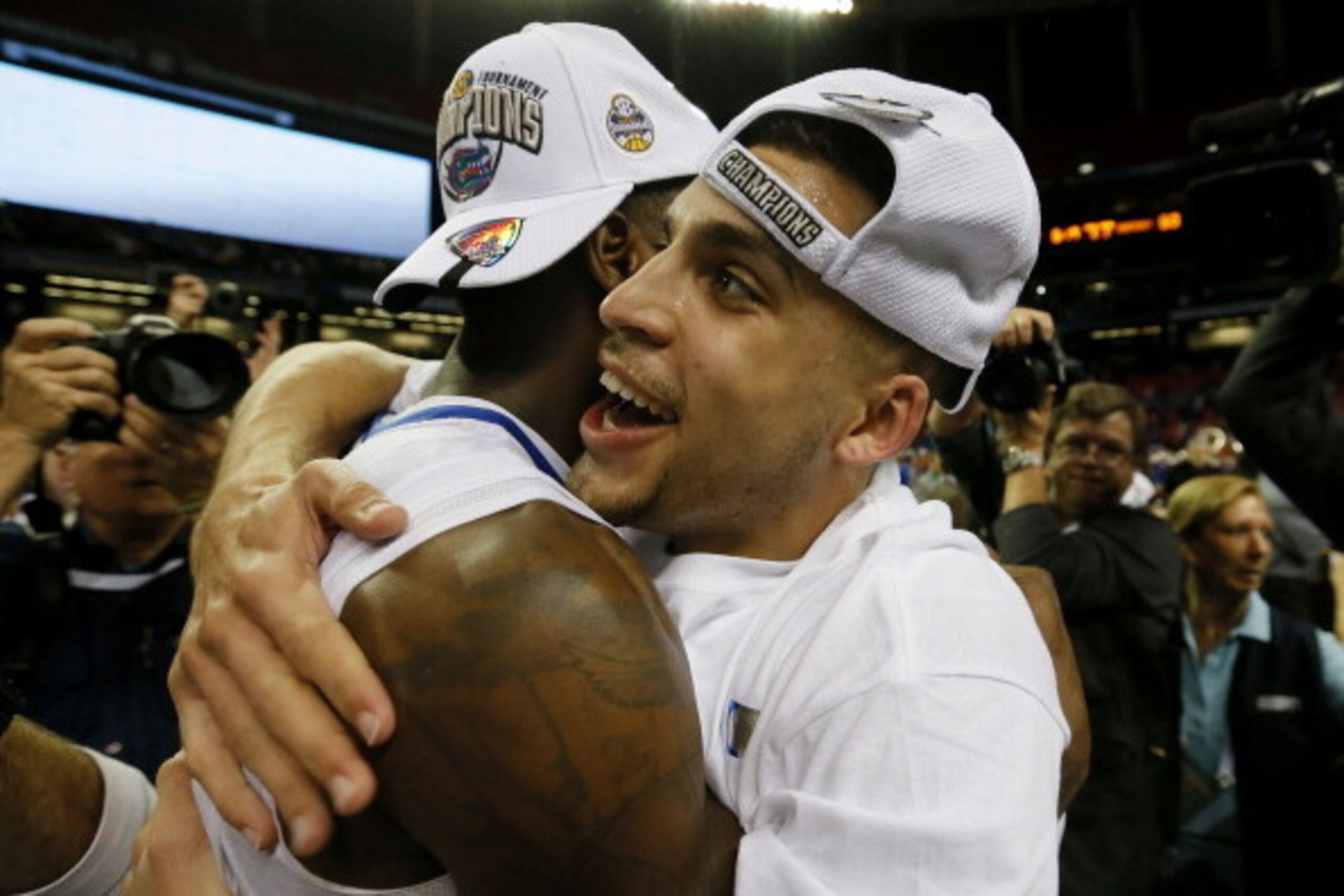 ATLANTA, GA - MARCH 16:  Scottie Wilbekin #5 of the Florida Gators celebrates their 61 to 60 win over the Kentucky Wildcats in the Championship game of the 2014 Men's SEC Basketball Tournament at Georgia Dome on March 16, 2014 in Atlanta, Georgia.  (Photo