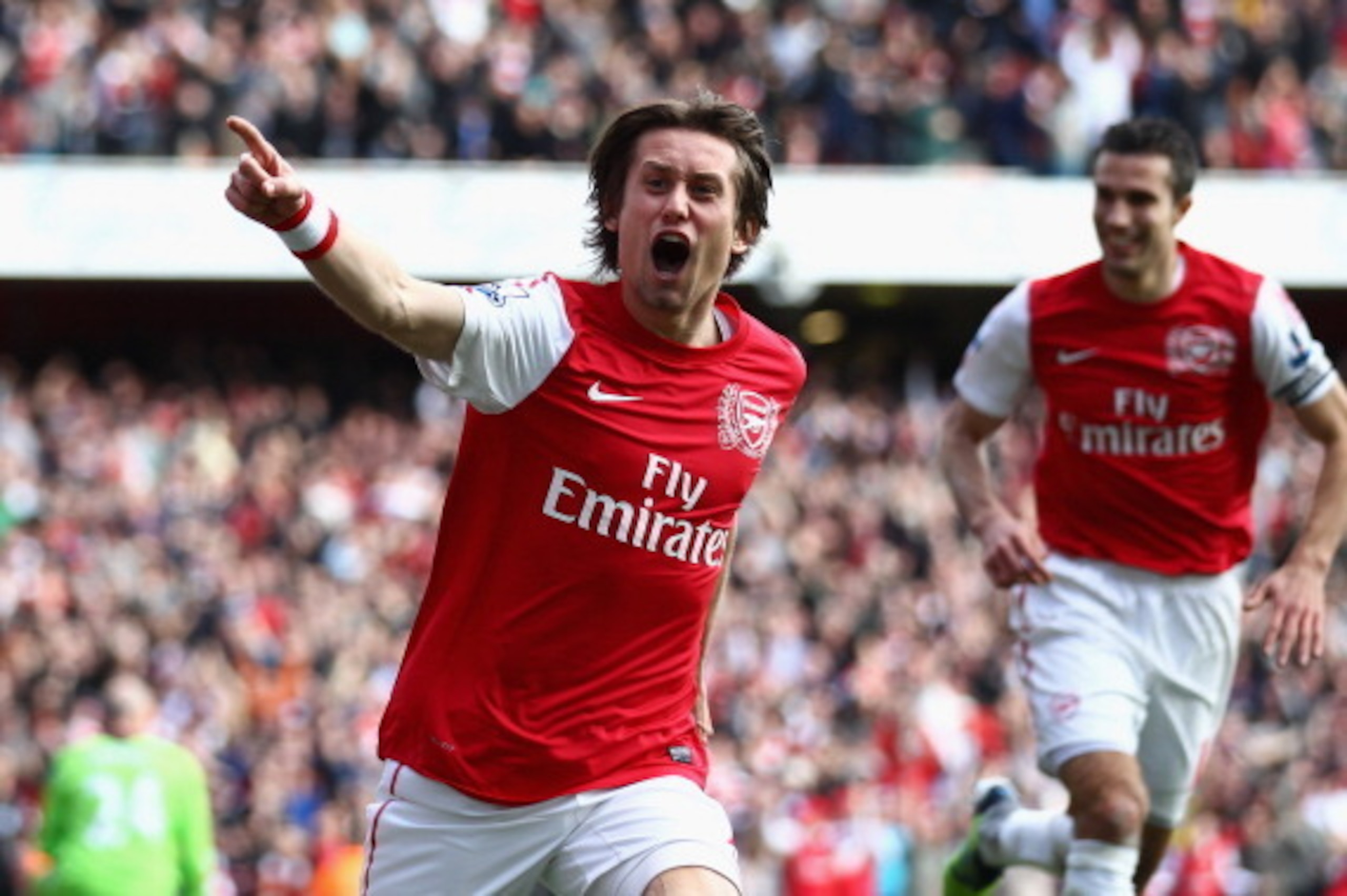 LONDON, ENGLAND - FEBRUARY 26:  Tomas Rosicky of Arsenal celebrates his goal during the Barclays Premier League match between Arsenal and Tottenham Hotspur at Emirates Stadium on February 26, 2012 in London, England.  (Photo by Clive Mason/Getty Images)