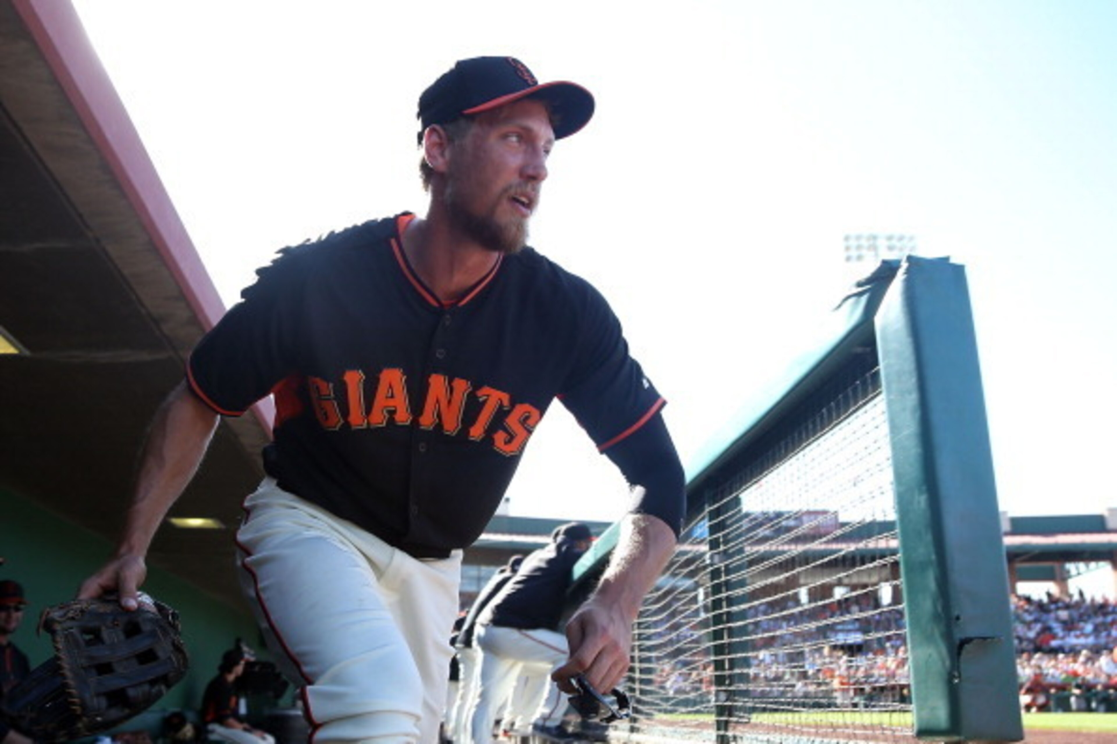 SCOTTSDALE, AZ - MARCH 15:  Hunter Pence #8 of the San Francisco Giants runs out onto the field during the spring training game against the Oakland Athletics at Scottsdale Stadium on March 15, 2014 in Scottsdale, Arizona. The A's defeated the Giants 8-1. 