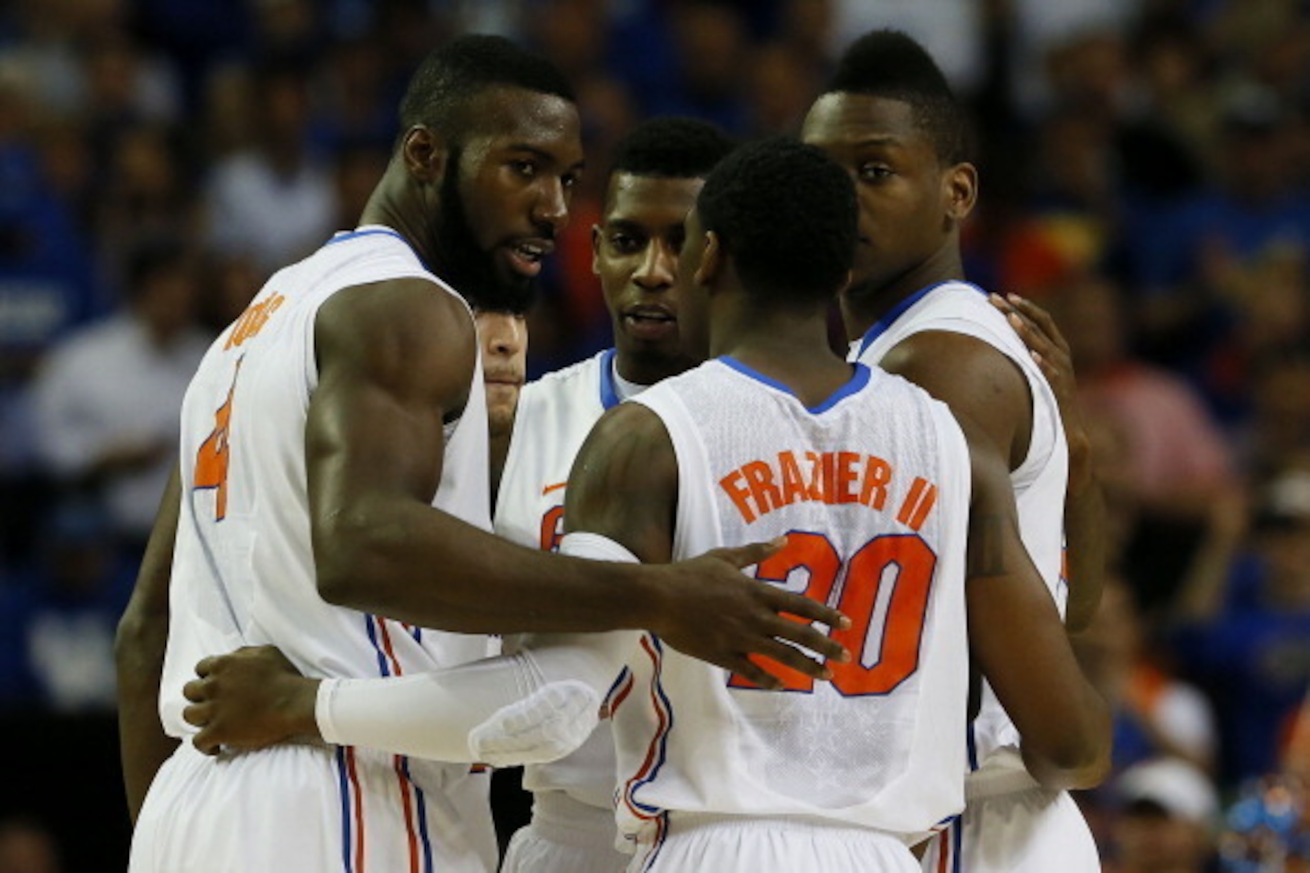 ATLANTA, GA - MARCH 16:  Casey Prather #24, Scottie Wilbekin #5, Will Yeguete #15, Michael Frazier II #20 and Patric Young #4 of the Florida Gators hullde in the first half against the Kentucky Wildcats during the Championship game of the 2014 Men's SEC B