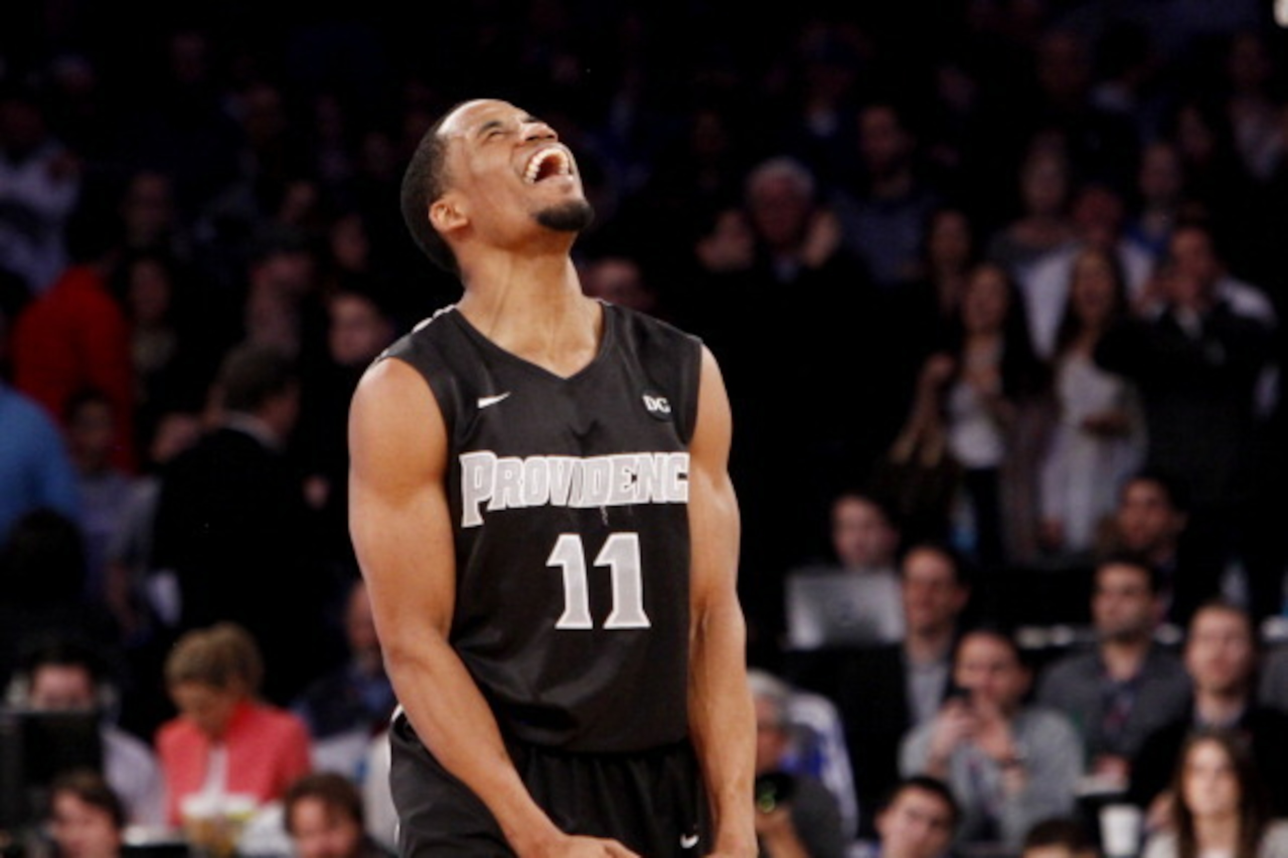 NEW YORK, NY - MARCH 15:  Bryce Cotton #11 of the Providence Friars celebrates in the final seconds of their 65 to 58 win over the Creighton Bluejays during the Championship game of the 2014 Men's Big East Basketball Tournament at Madison Square Garden on