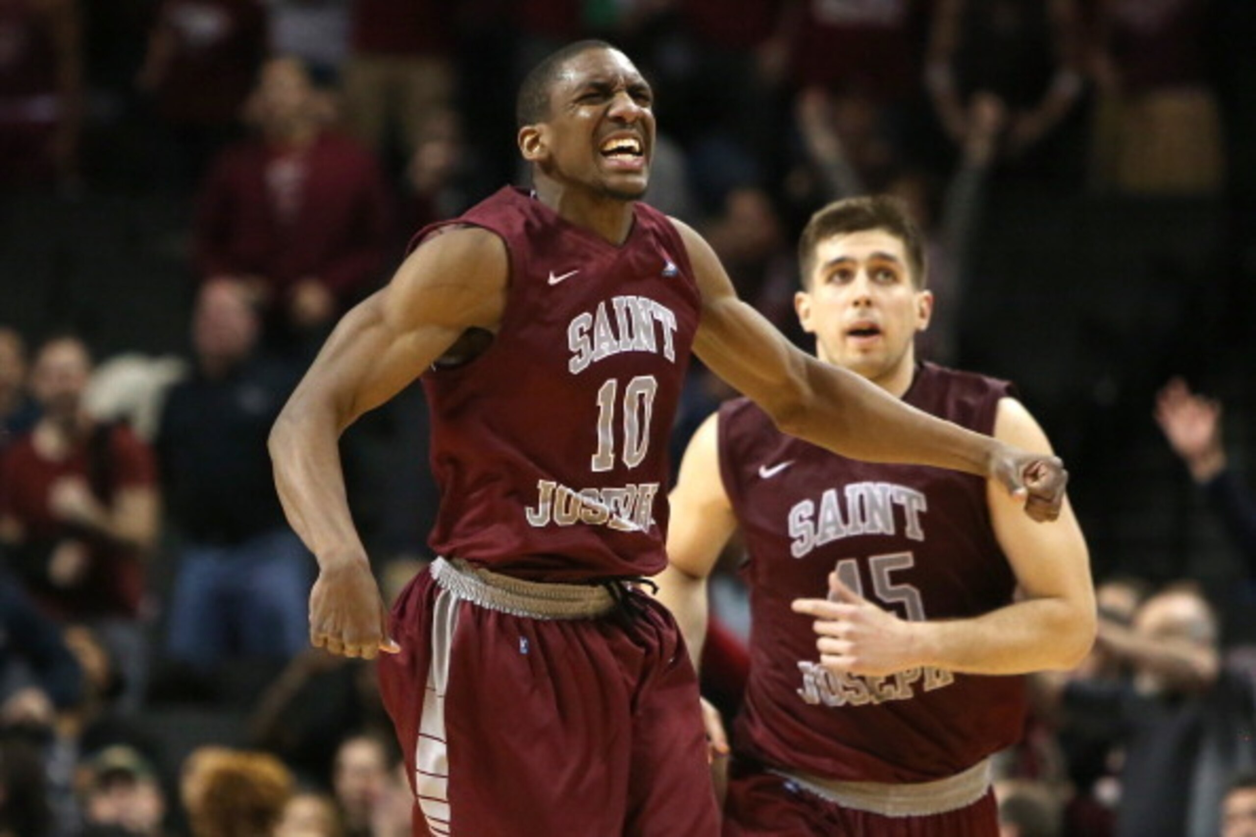 NEW YORK, NY - MARCH 16:  Langston Galloway #10 of the Saint Joseph's Hawks celebrates after a basket in the second half against the Virginia Commonwealth Rams during the Championship game of the 2014 Atlantic 10 Men's Basketball Tournament at Barclays Ce