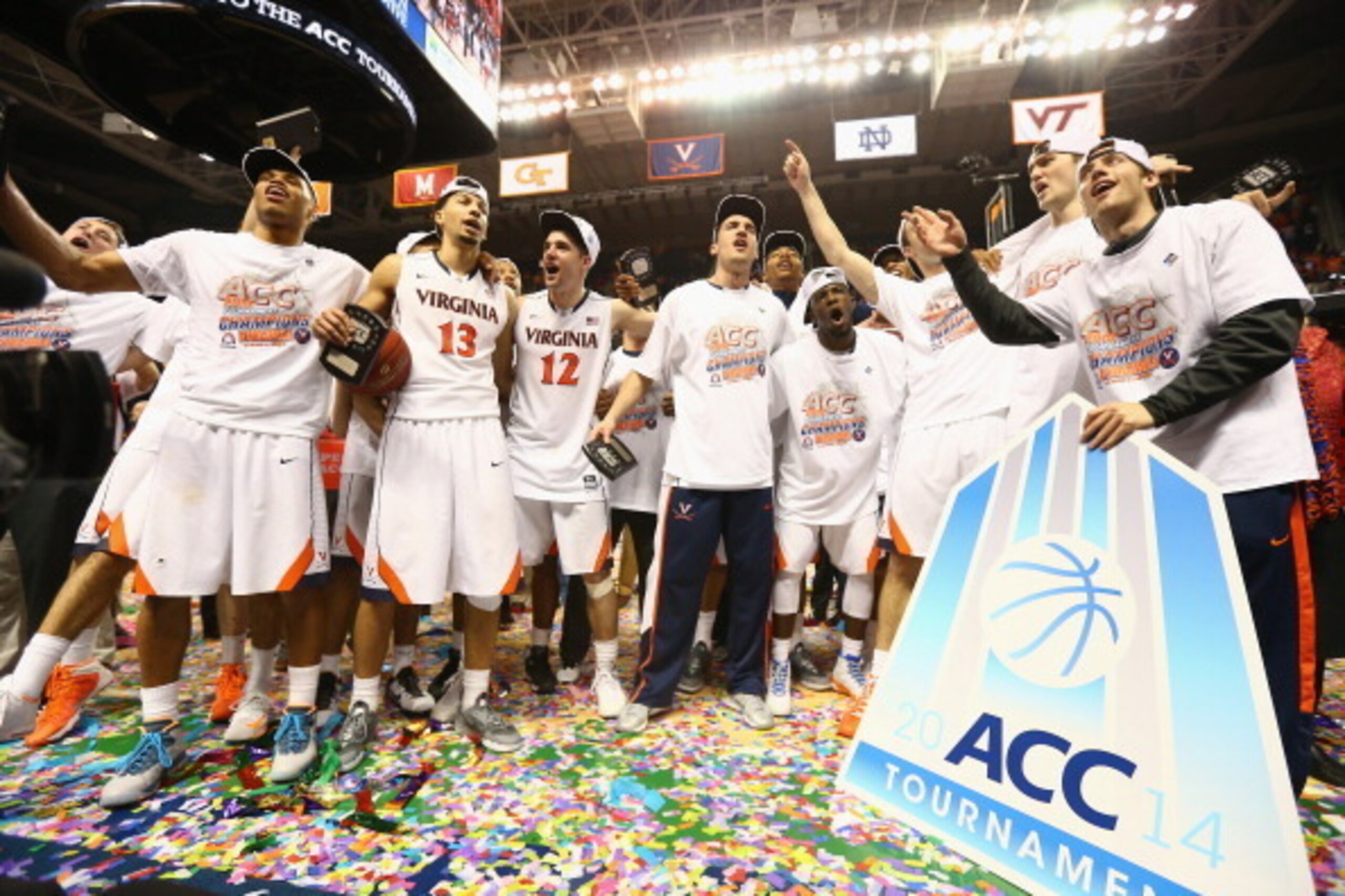 GREENSBORO, NC - MARCH 16:  The Virginia Cavaliers celebrate after defeating the Duke Blue Devils to win the the championship game of the 2014 Men's ACC Basketball Tournament at Greensboro Coliseum on March 16, 2014 in Greensboro, North Carolina.  (Photo 