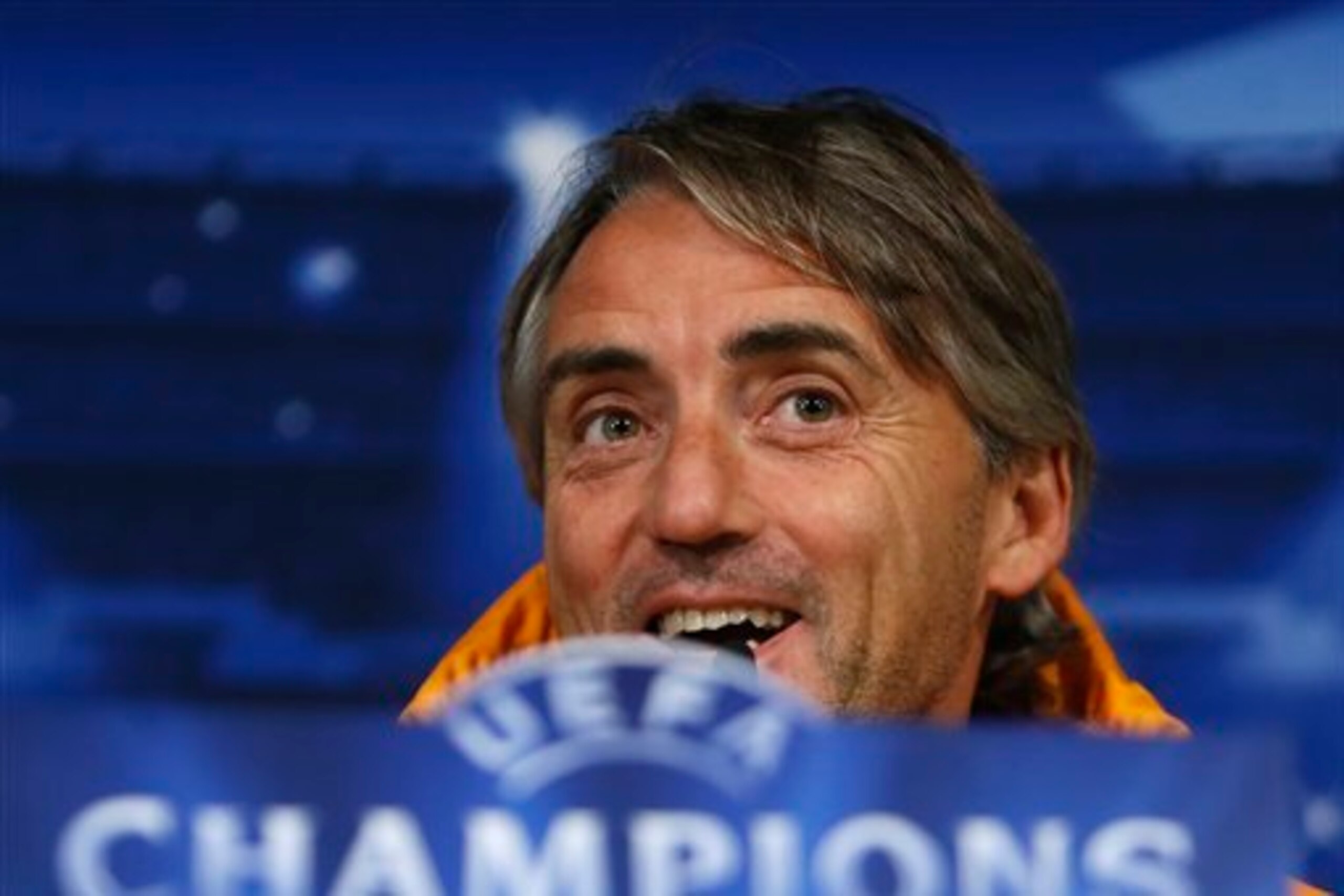 It didn't take long for Mancini to find himself back behind a microphone at a Champions League presser.