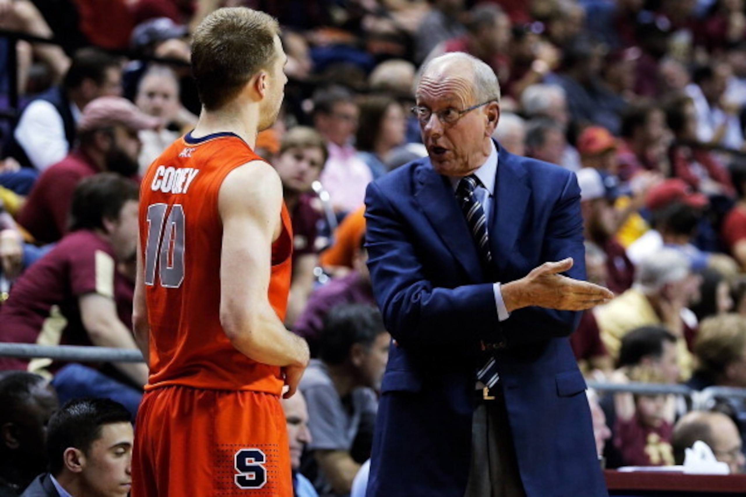 TALLAHASSEE, FL - MARCH 09:  Head coach Jim Boeheim of the Syracuse Orangemen speaks with Trevor Cooney #10 during a game against the Florida State Seminoles at the Donald L. Tucker Center on March 9, 2014 in Tallahassee, Florida.  Syracuse won the game 7
