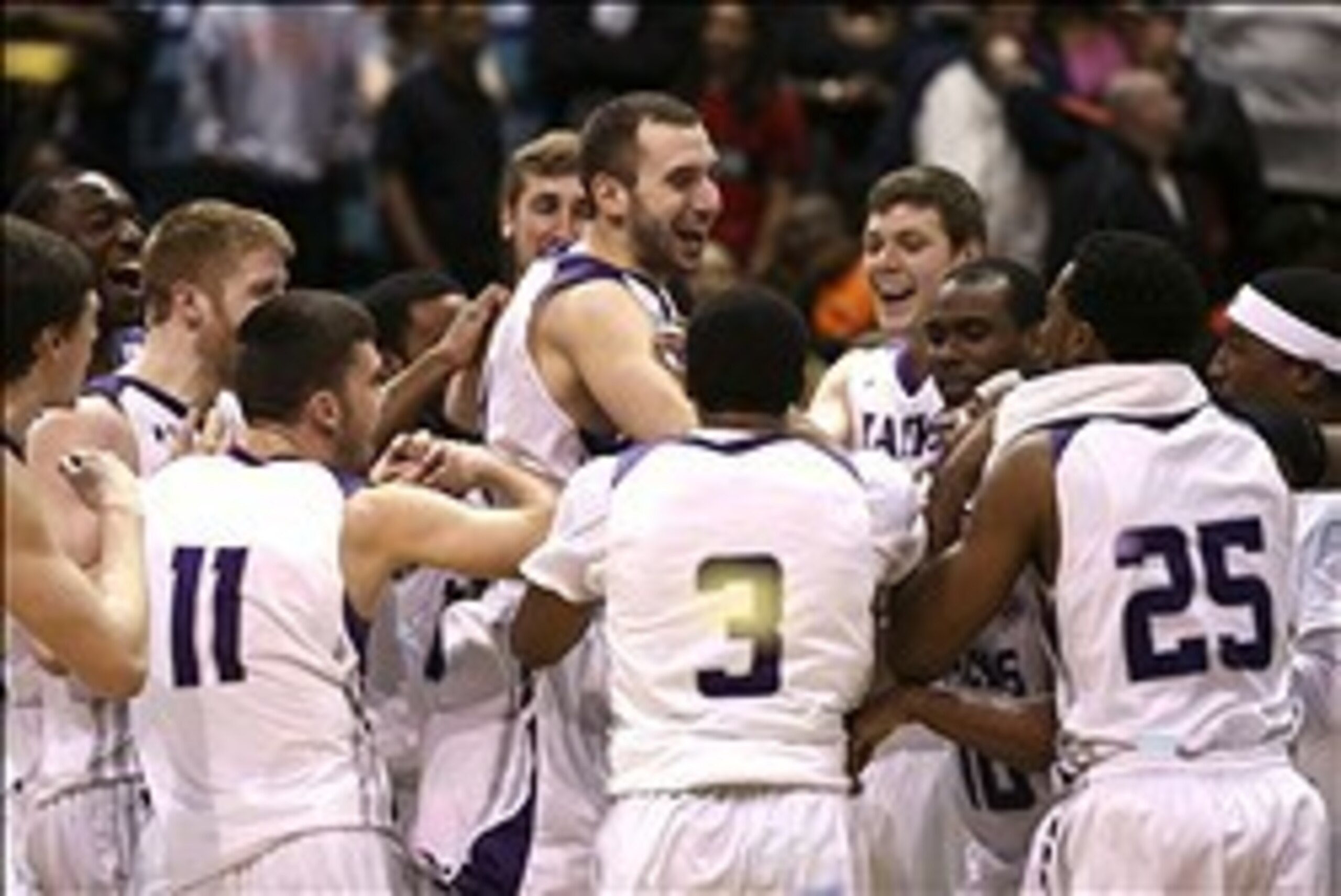 Mar 15, 2014; Katy, TX, USA; Stephen F. Austin Lumberjacks teammates celebrate following their win over Sam Houston State Bearkats in the championship game for the Southland Conference college basketball tournament at Merrell Center. Stephen F. Austin Lum