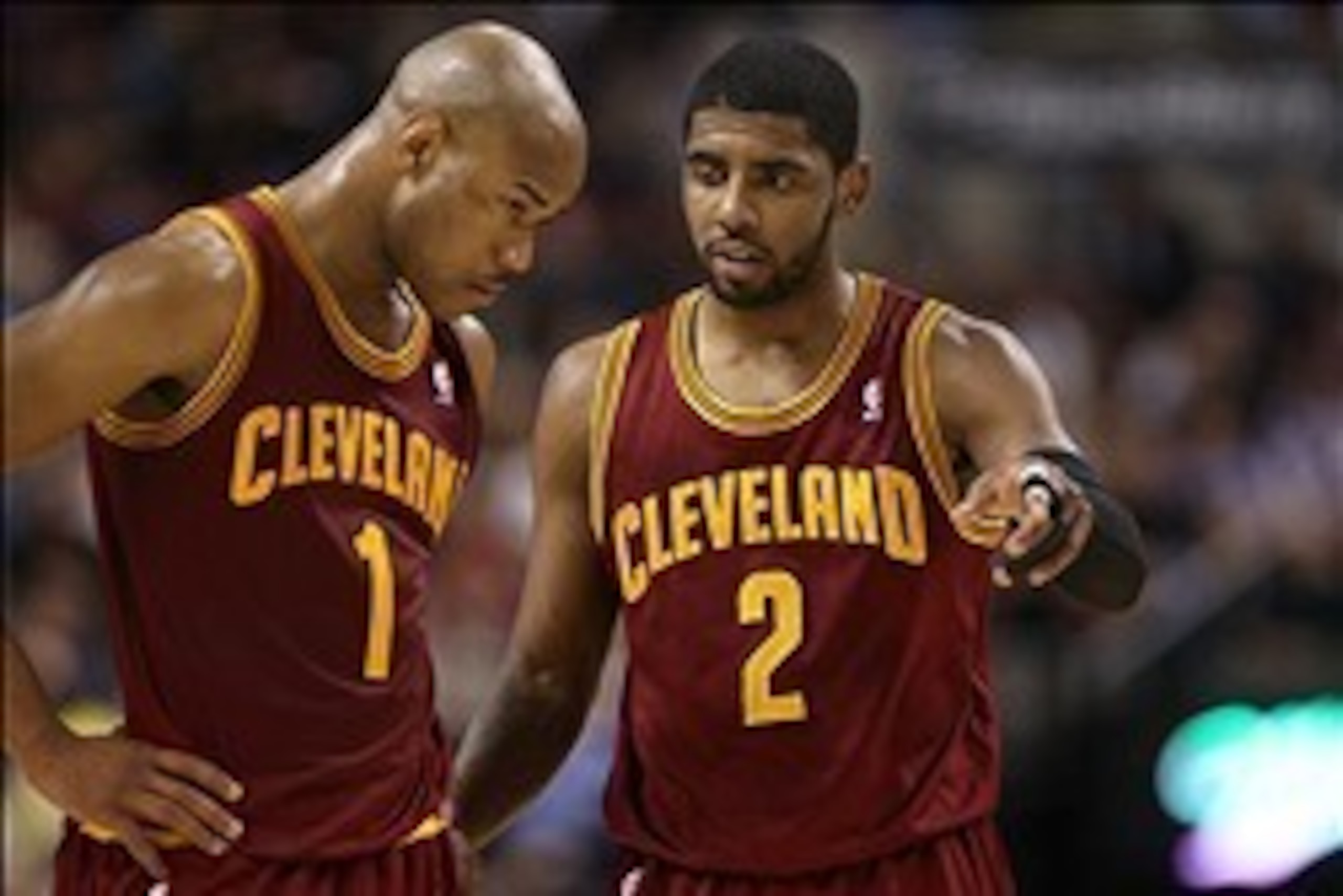Feb 21, 2014; Toronto, Ontario, CAN; Cleveland Cavaliers guard Kyrie Irving (2) talks to guard Jarrett Jack (1) against the Toronto Raptors at Air Canada Centre. The Raptors beat the Cavaliers 98-91. Mandatory Credit: Tom Szczerbowski-USA TODAY Sports