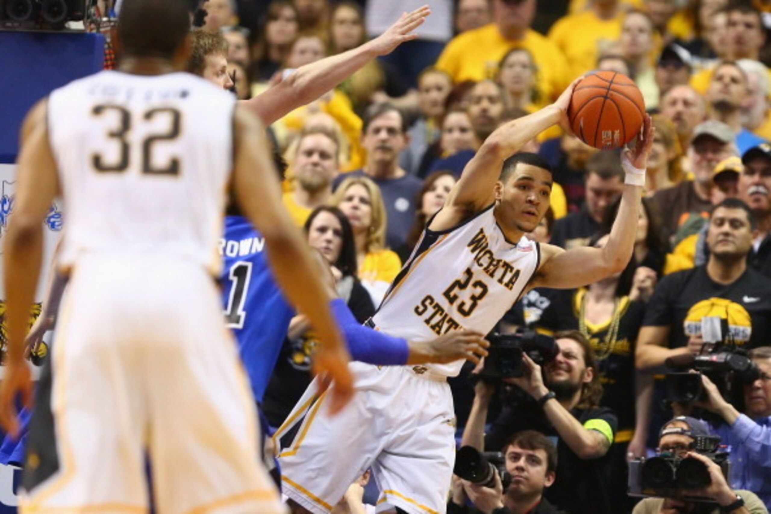 ST. LOUIS, MO - MARCH 9: Fred VanVleet #23 of the Wichita State Shockers looks to pass the ball against the Indiana State Sycamores during the MVC Basketball Tournament Championship game at the Scottrade Center on March 9, 2014 in St. Louis, Missouri.  Th