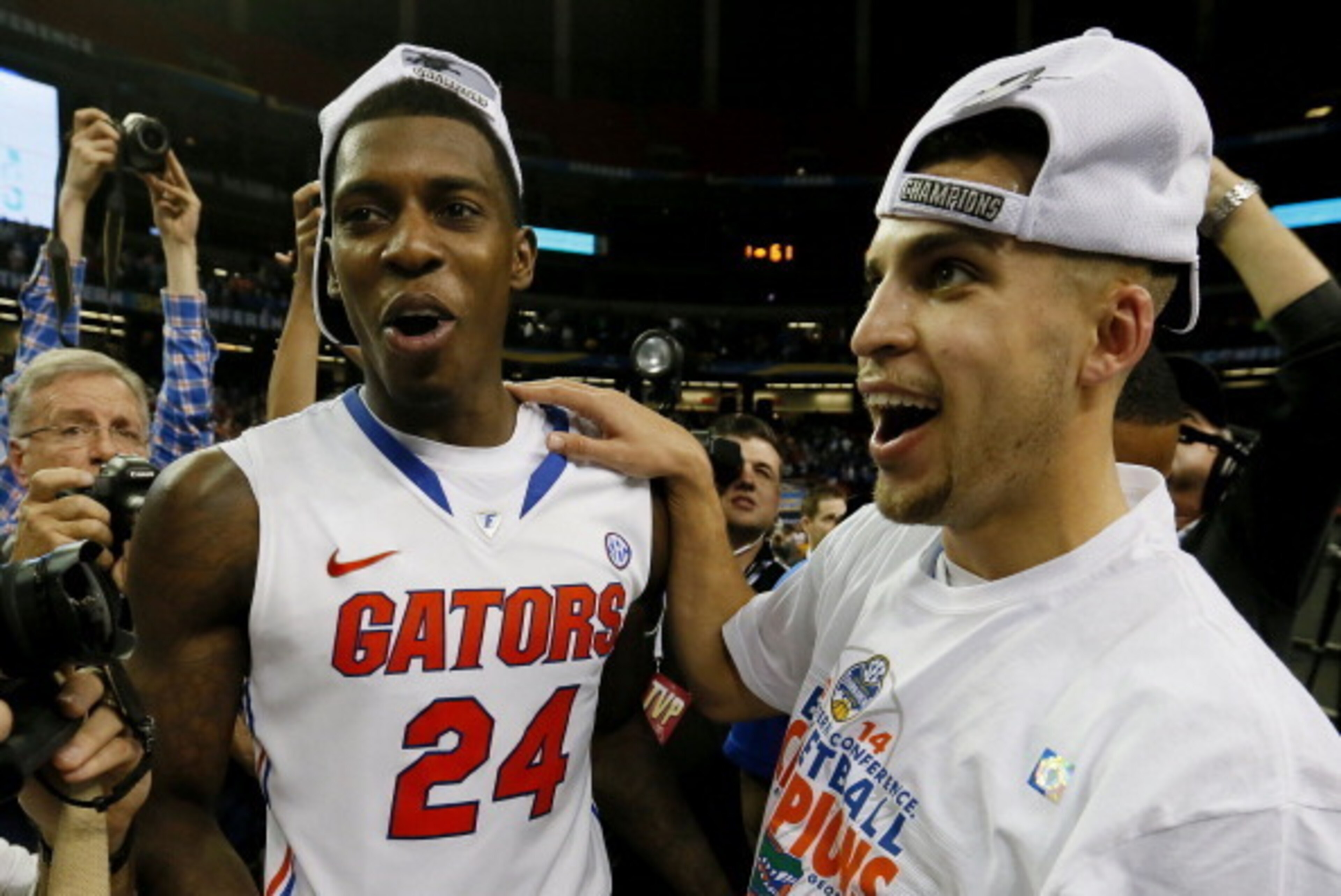 ATLANTA, GA - MARCH 16: Scottie Wilbekin #5 and Casey Prather #24 of the Florida Gators celebrate their 61 to 60 win over the Kentucky Wildcats in the Championship game of the 2014 Men's SEC Basketball Tournament at Georgia Dome on March 16, 2014 in Atla ATLANTA, GA - MARCH 16: Scottie Wilbekin #5 and Casey Prather #24 of the Florida Gators celebrate their 61 to 60 win over the Kentucky Wildcats in the Championship game of the 2014 Men's SEC Basketball Tournament at Georgia Dome on March 16, 2014 in Atla