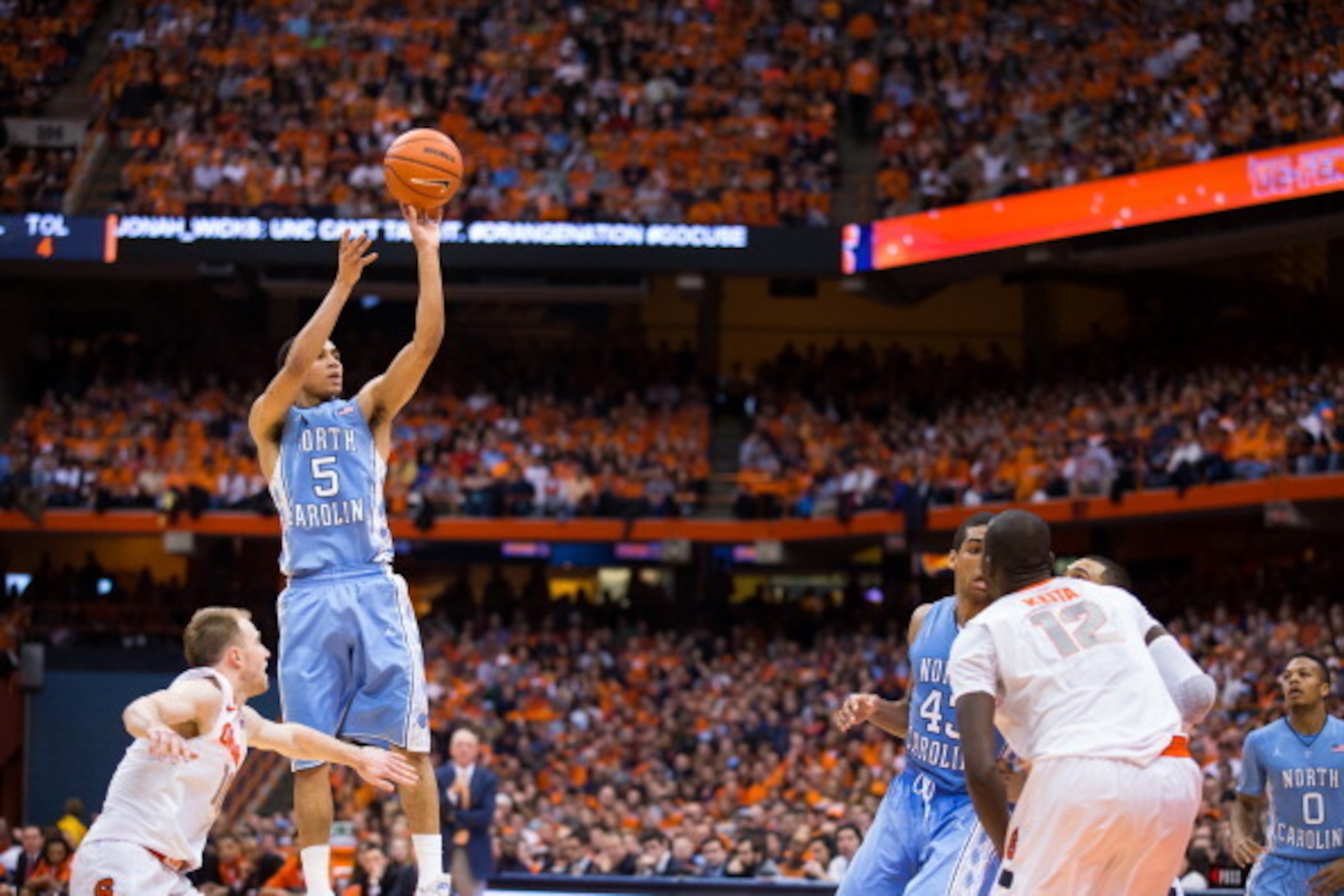 SYRACUSE, NY - JANUARY 11: Marcus Paige #5 of the North Carolina Tar Heels puts in a second half field goal against the Syracuse Orange on January 11, 2014 at The Carrier Dome in Syracuse, New York. Syracuse defeats North Carolina 57-45. (Photo by Brett SYRACUSE, NY - JANUARY 11: Marcus Paige #5 of the North Carolina Tar Heels puts in a second half field goal against the Syracuse Orange on January 11, 2014 at The Carrier Dome in Syracuse, New York. Syracuse defeats North Carolina 57-45. (Photo by Brett