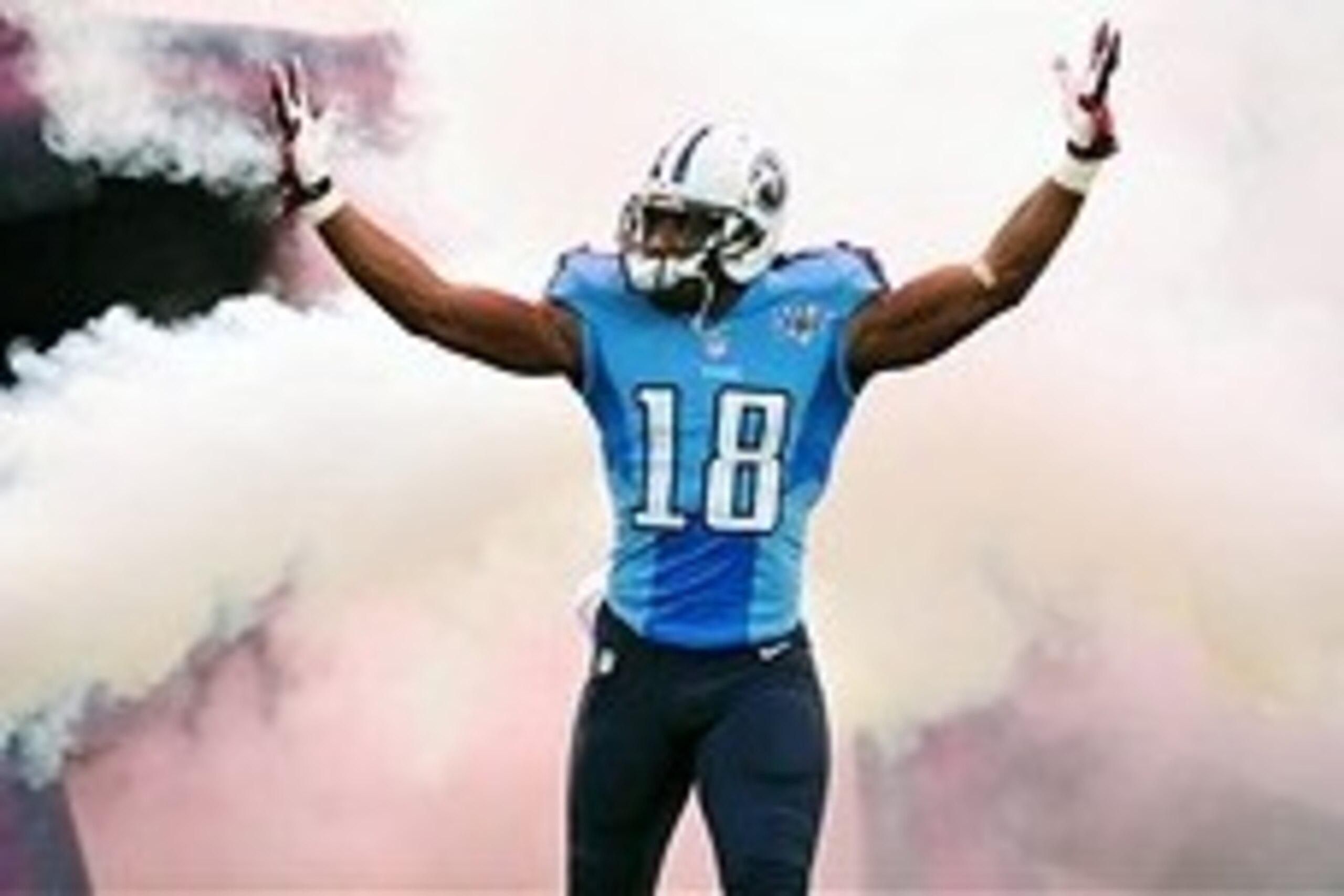 Aug 24, 2013; Nashville, TN, USA; Tennessee Titans wide receiver Kenny Britt (18) is introduced before a game against the Atlanta Falcons at LP Field. The Titans beat the Falcons 27-16. Mandatory Credit: Don McPeak-USA TODAY Sports