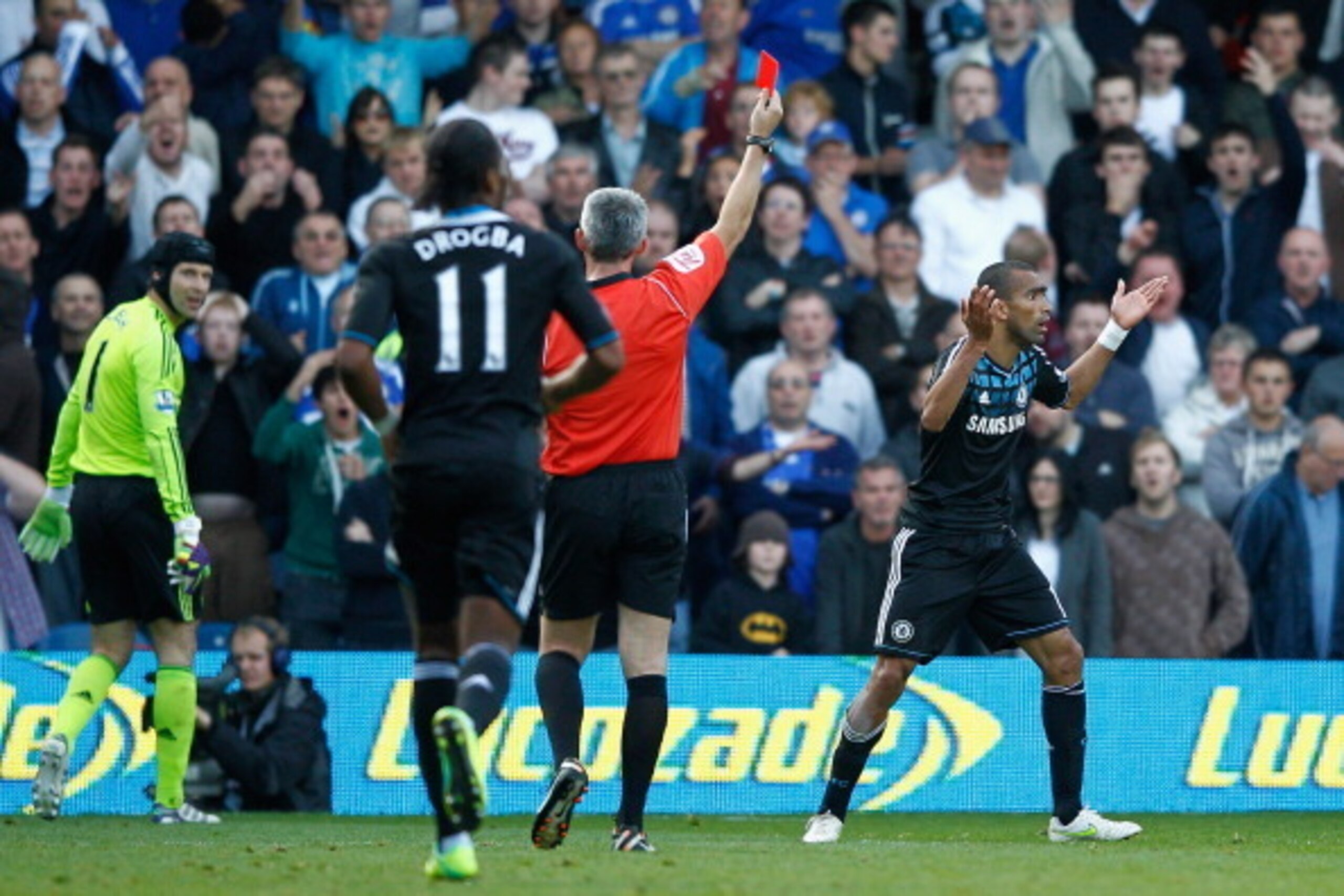 LONDON, ENGLAND - OCTOBER 23:  Jose Bosingwa of Chelsea is amazed as he is sent off by referee Chris Foy during the Barclays Premier League match between Queens Park Rangers and Chelsea at Loftus Road on October 23, 2011 in London, England.  (Photo by Pau