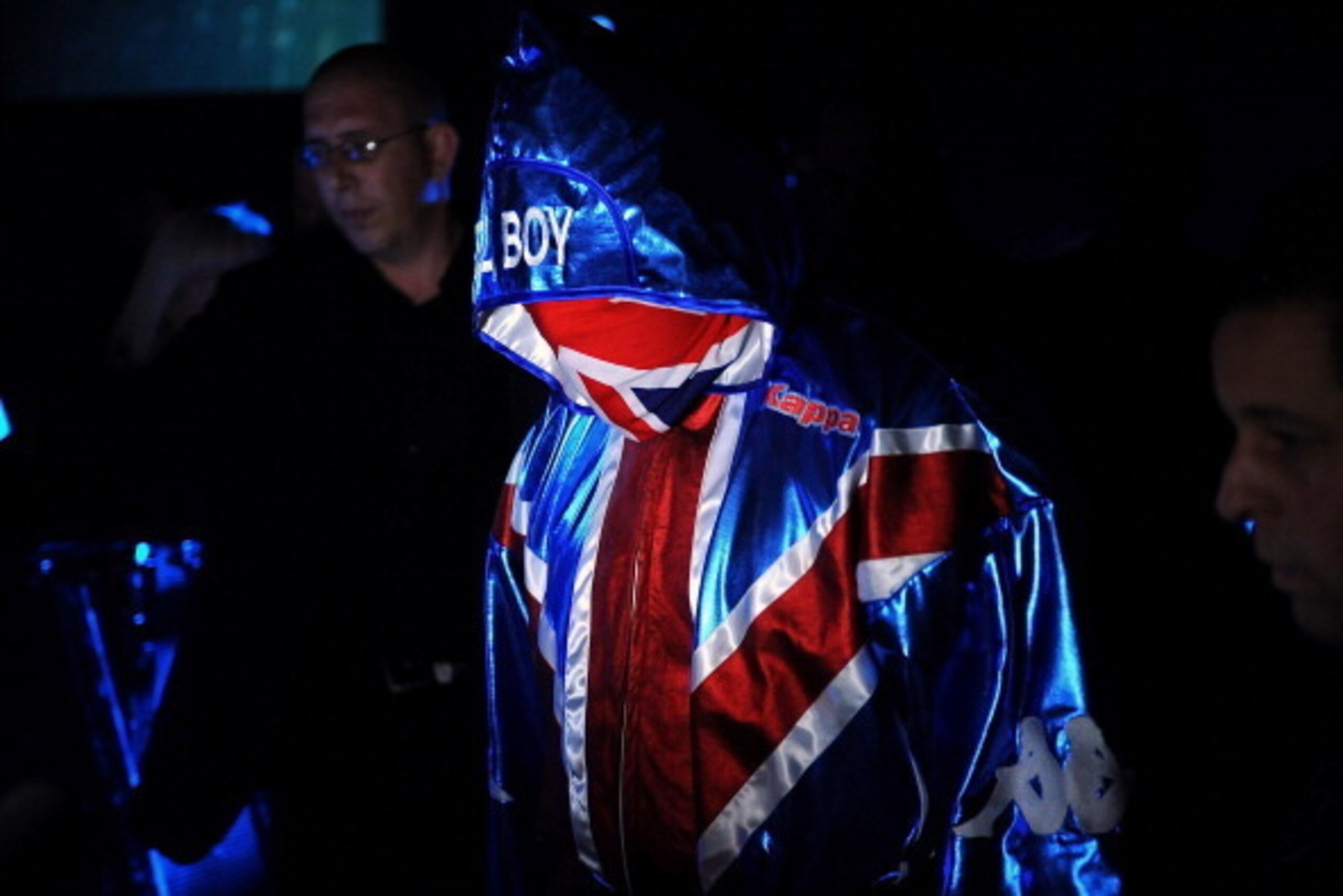 LONDON, ENGLAND - JULY 23:  Dereck Chisora enters the ring wearing a Union Flag gown and a Union Flag scarf during the British & Commonwealth Heavyweight Title Fight between Dereck Chisora and Tyson Fury at Wembley Arena on July 23, 2011 in London, Englan