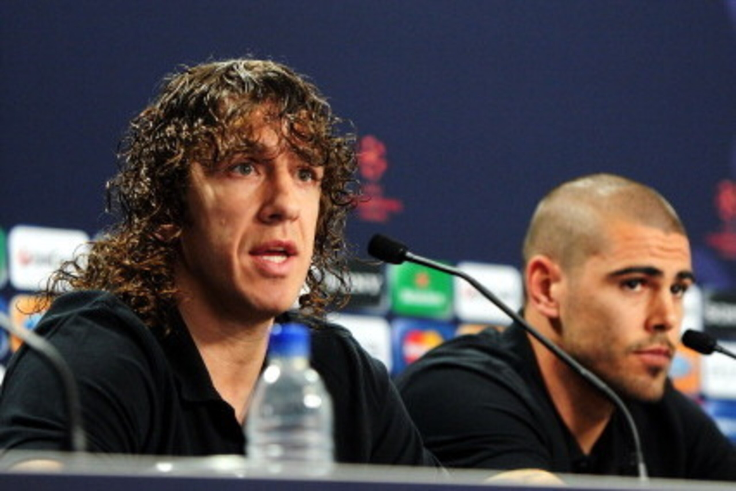 LONDON, ENGLAND - MAY 27:  In this UEFA handout image Victor Valdes (R) and Carles Puyol attend the FC Barcelona press conference ahead of the UEFA Champions League Final against Manchester United at Wembley Stadium on May 27, 2011 in London, England.  (P
