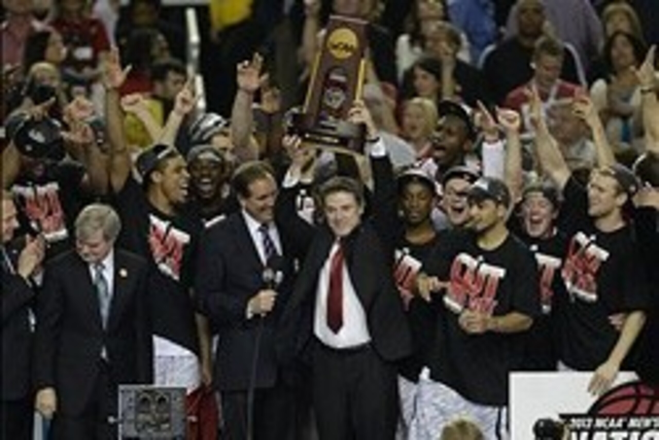 Apr 8, 2013; Atlanta, GA, USA; Louisville Cardinals head coach Rick Pitino celebrates winning the national championship 82-76 against the Michigan Wolverines during the second half of the championship game in the 2013 NCAA mens Final Four at the Georgia D Apr 8, 2013; Atlanta, GA, USA; Louisville Cardinals head coach Rick Pitino celebrates winning the national championship 82-76 against the Michigan Wolverines during the second half of the championship game in the 2013 NCAA mens Final Four at the Georgia D
