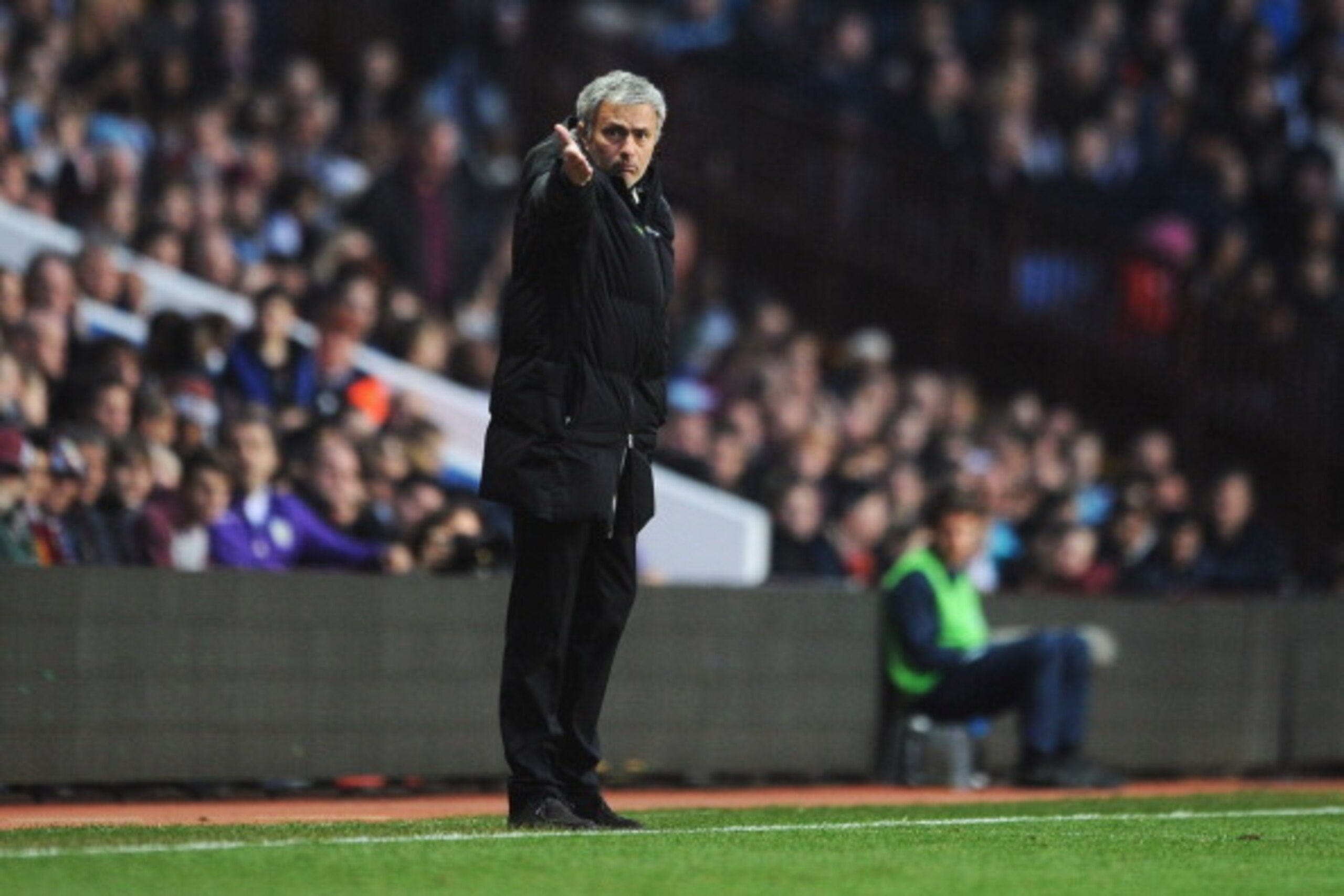 BIRMINGHAM, ENGLAND - MARCH 15:  Jose Mourinho manager of Chelsea signals during the Barclays Premier League match between Aston Villa and Chelsea at Villa Park on March 15, 2014 in Birmingham, England.  (Photo by Chris Brunskill/Getty Images)