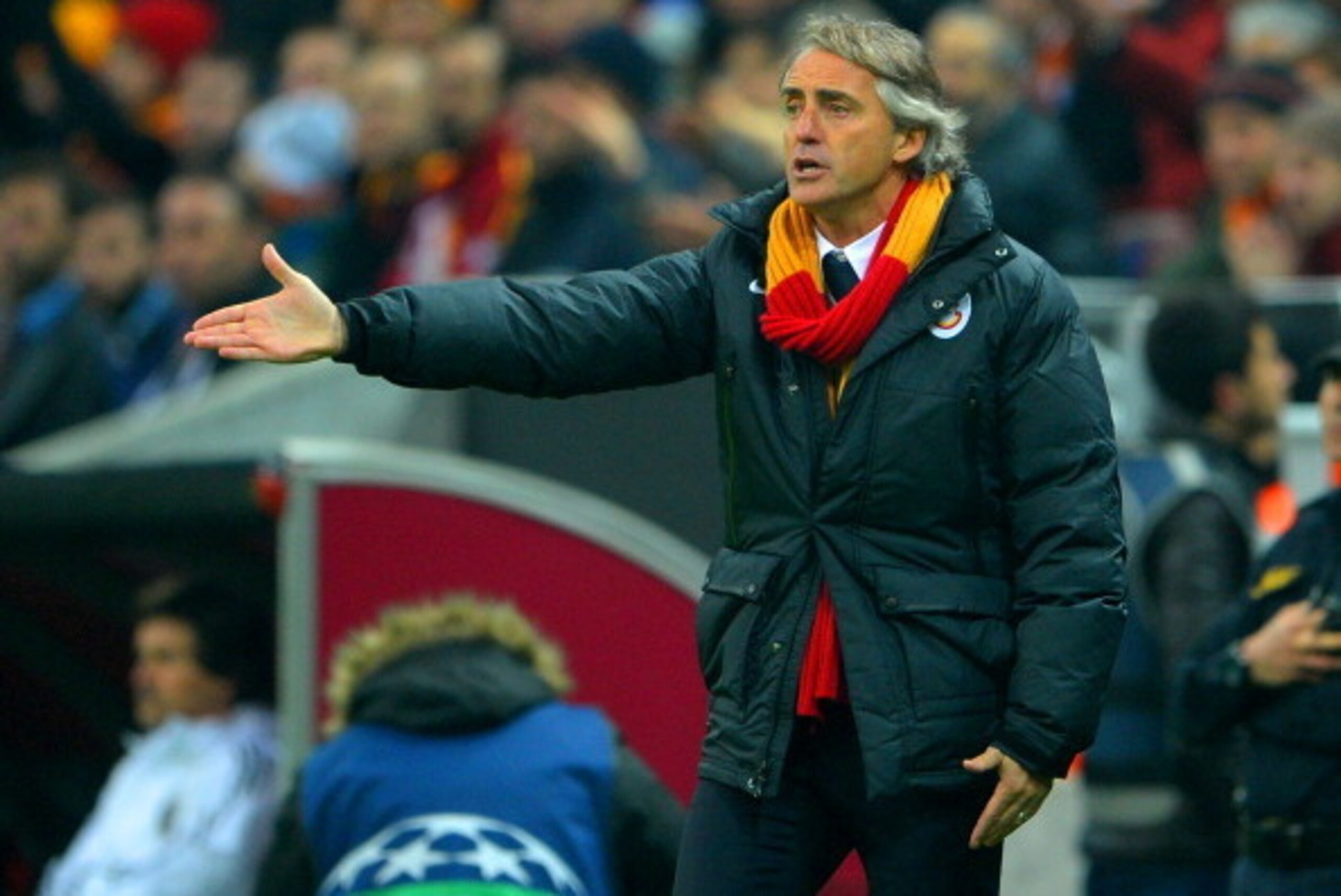 ISTANBUL, TURKEY - FEBRUARY 26: Head Coach Roberto Mancini of Galatasaray gives instructions  during the UEFA Champions League Round of 16 first leg match between Galatasaray AS and Chelsea at Ali Sami Yen Arena on February 26, 2014 in Istanbul, Turkey.  