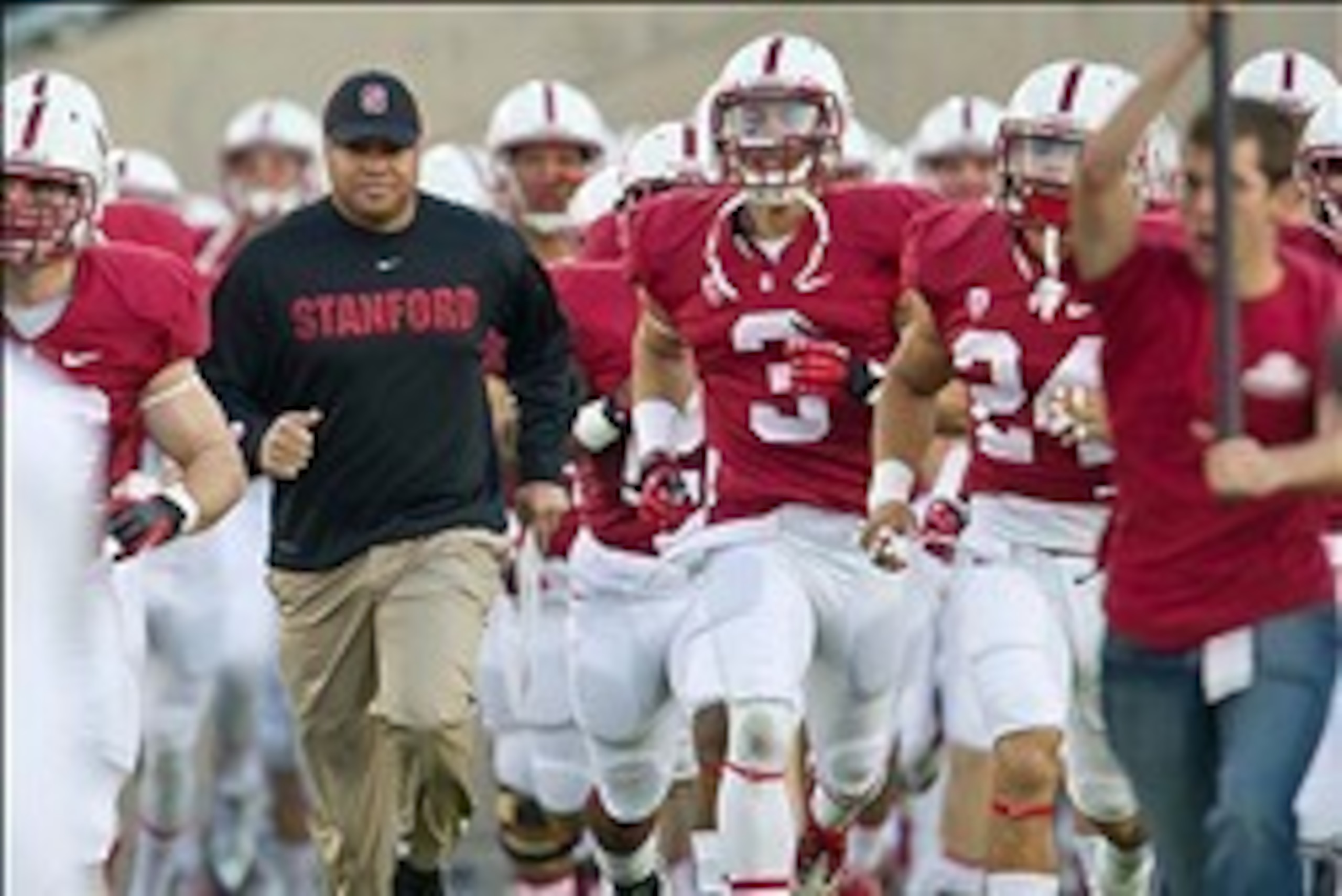 Nov 30, 2013; Stanford, CA, USA; Stanford Cardinal head coach David Shaw runs onto the field with his players before the game against the Notre Dame Fighting Irish at Stanford Stadium. Mandatory Credit: Matt Cashore-USA TODAY Sports Nov 30, 2013; Stanford, CA, USA; Stanford Cardinal head coach David Shaw runs onto the field with his players before the game against the Notre Dame Fighting Irish at Stanford Stadium. Mandatory Credit: Matt Cashore-USA TODAY Sports