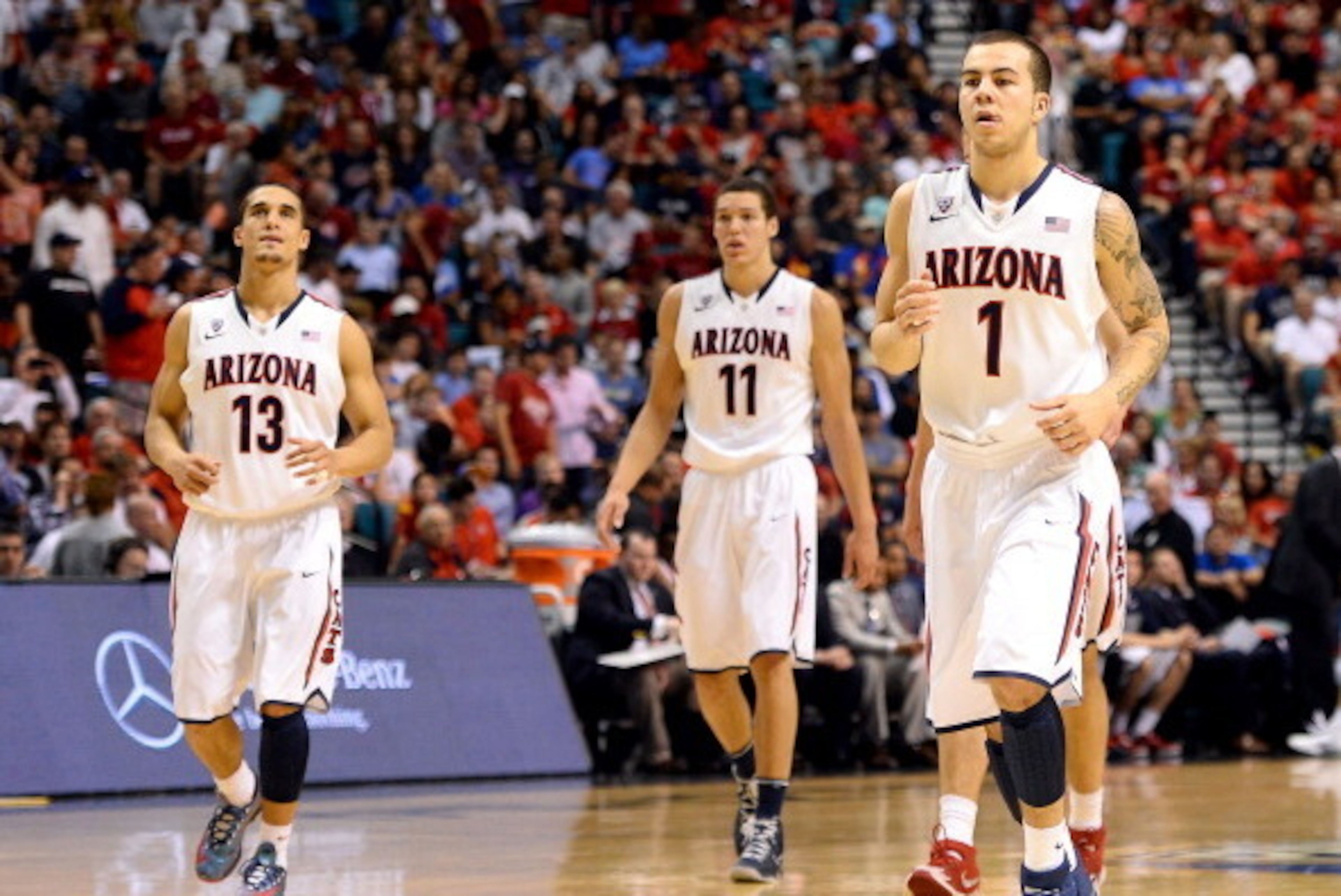 LAS VEGAS, NV - MARCH 15: Nick Johnson #13, Aaron Gordon #11 and Gabe York #1 of the Arizona Wildcats walk on the court during the championship game of the Pac-12 Basketball Tournament against the UCLA Bruins at the MGM Grand Garden Arena on March 15, 20 LAS VEGAS, NV - MARCH 15: Nick Johnson #13, Aaron Gordon #11 and Gabe York #1 of the Arizona Wildcats walk on the court during the championship game of the Pac-12 Basketball Tournament against the UCLA Bruins at the MGM Grand Garden Arena on March 15, 20