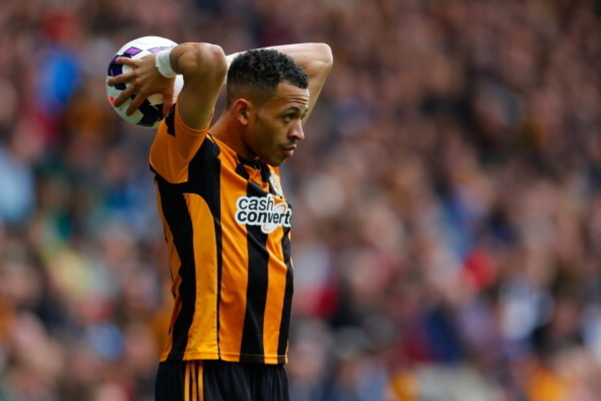 HULL, ENGLAND - MARCH 15: Liam Rosenior of Hull City in action during the Barclays Premier League match between Hull City and Manchester City at the KC Stadium on March 15, 2014 in Hull, England. (Photo by Paul Thomas/Getty Images)