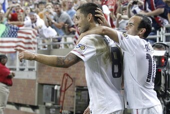 DETROIT, MI - JUNE 7: Clint Dempsey #8 of the United States celebrates a second half goal with Landon Donovan #10 while playing Canada during the 2011 Gold Cup  at Ford Field on June 7, 2011 in Detroit, Michigan. The United States won the game 2-0. (Photo