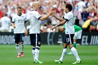 WASHINGTON, DC - JUNE 02:  Jermaine Jones #13 of the United States Men's National Team celebrates with Michael Bradley #4 after a goal against the Germany Men's National Team in an international friendly at RFK Stadium on June 2, 2013  in Washington, DC. 