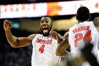 Mar 16, 2014; Atlanta, GA, USA; Florida Gators  center Patric Young (4) and forward Casey Prather (24) react as time expires and their team defeat the Kentucky Wildcats in the championship game for the SEC college basketball tournament at Georgia Dome. Fl