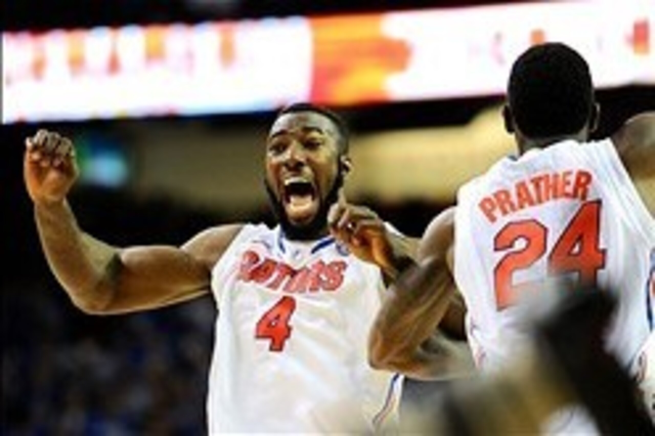 Mar 16, 2014; Atlanta, GA, USA; Florida Gators  center Patric Young (4) and forward Casey Prather (24) react as time expires and their team defeat the Kentucky Wildcats in the championship game for the SEC college basketball tournament at Georgia Dome. Fl