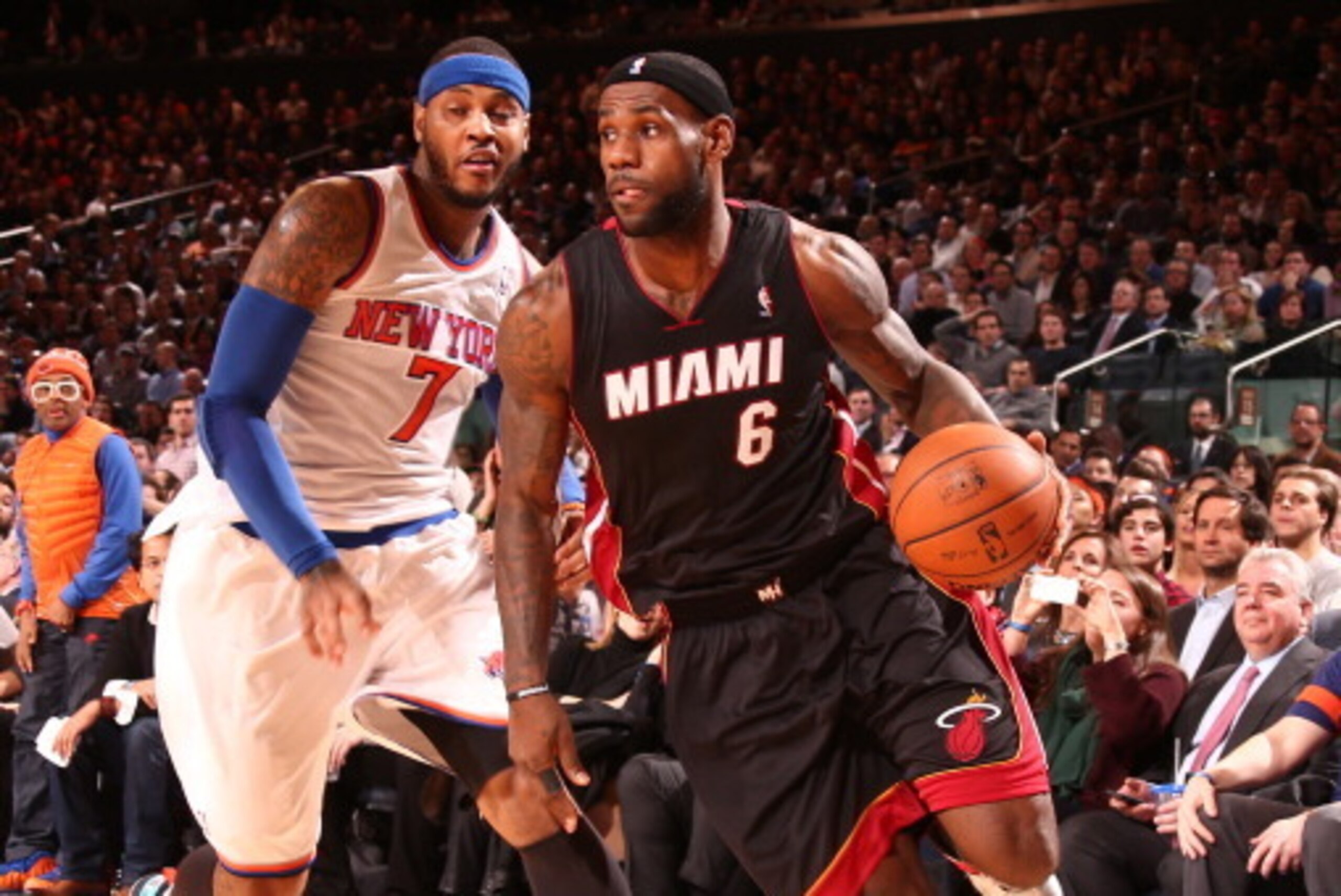 NEW YORK, NY - JANUARY 9: LeBron James #6 of the Miami Heat drives against Carmelo Anthony #7 of the New York Knicks during a game at Madison Square Garden in New York City on January 9, 2014.  NOTE TO USER: User expressly acknowledges and agrees that, by