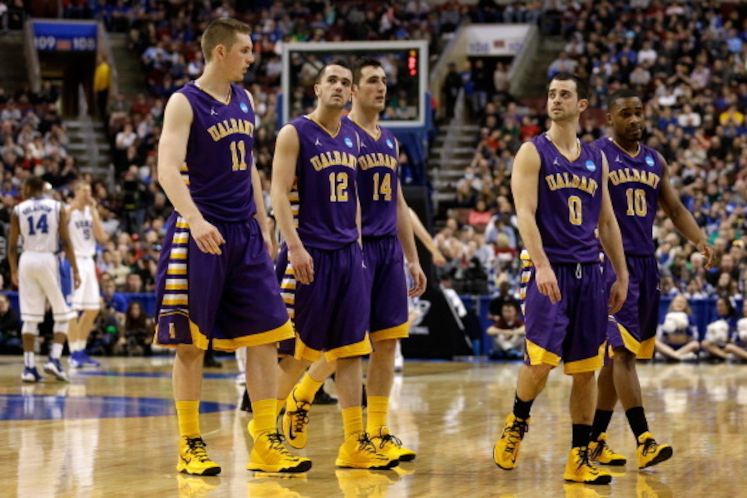 PHILADELPHIA, PA - MARCH 22:  Luke Devlin #11, Peter Hooley #12, Sam Rowley #14, Jacob Iati #0 and Mike Black #10 of the Albany Great Danes on the court in the final minute against the Duke Blue Devils during the second round of the 2013 NCAA Men's Basket