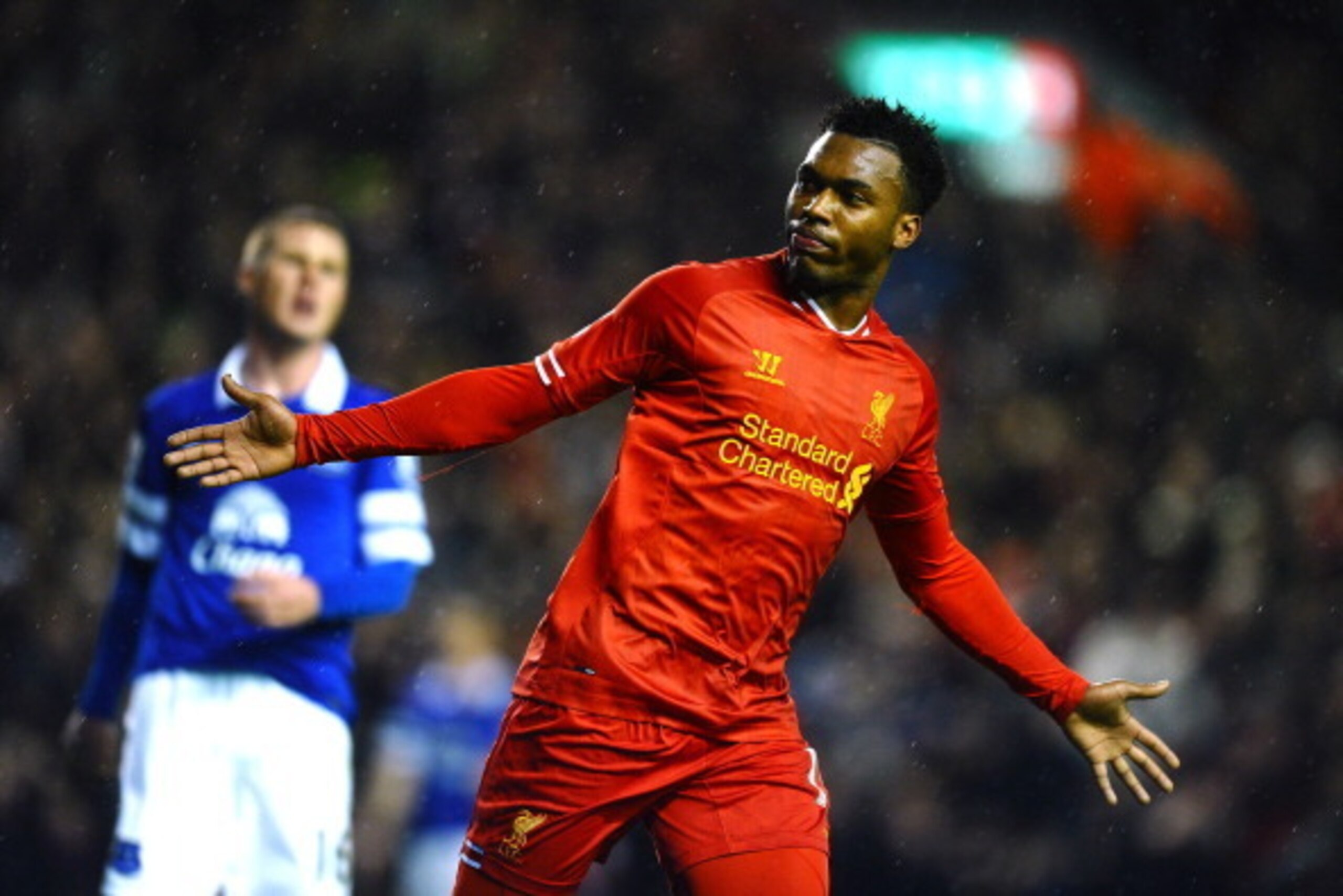 LIVERPOOL, ENGLAND - JANUARY 28:  Daniel Sturridge of Liverpool celebrates after scoring his team's second goal during the Barclays Premier League match between Liverpool and Everton at Anfield on January 28, 2014 in Liverpool, England.  (Photo by Laurenc