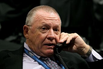 LOS ANGELES, CA - JUNE 25:  Carolina Hurricanes President and General Manager Jim Rutherford speaks on the phone during the 2010 NHL Entry Draft at Staples Center on June 25, 2010 in Los Angeles, California.  (Photo by Bruce Bennett/Getty Images)