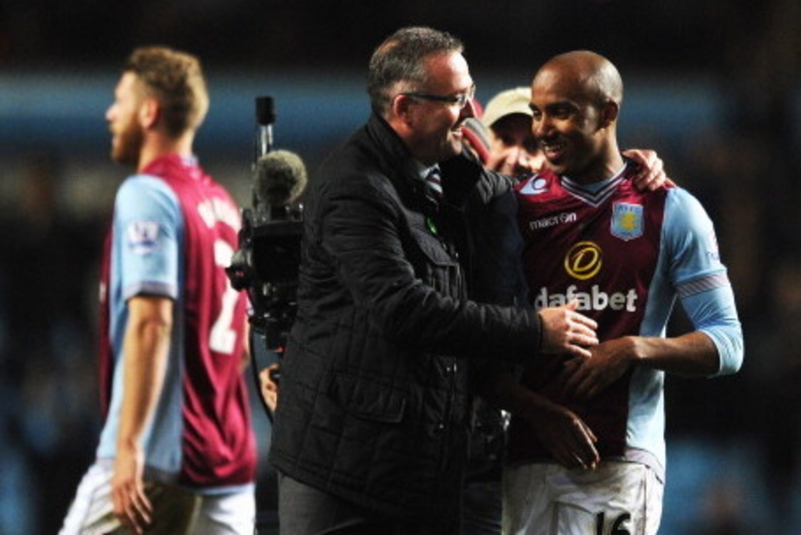 BIRMINGHAM, ENGLAND - MARCH 15:  Paul Lambert manager of Aston Villa congratulates goal scorer Fabian Delph of Aston Villa after the Barclays Premier League match between Aston Villa and Chelsea at Villa Park on March 15, 2014 in Birmingham, England.  (Ph