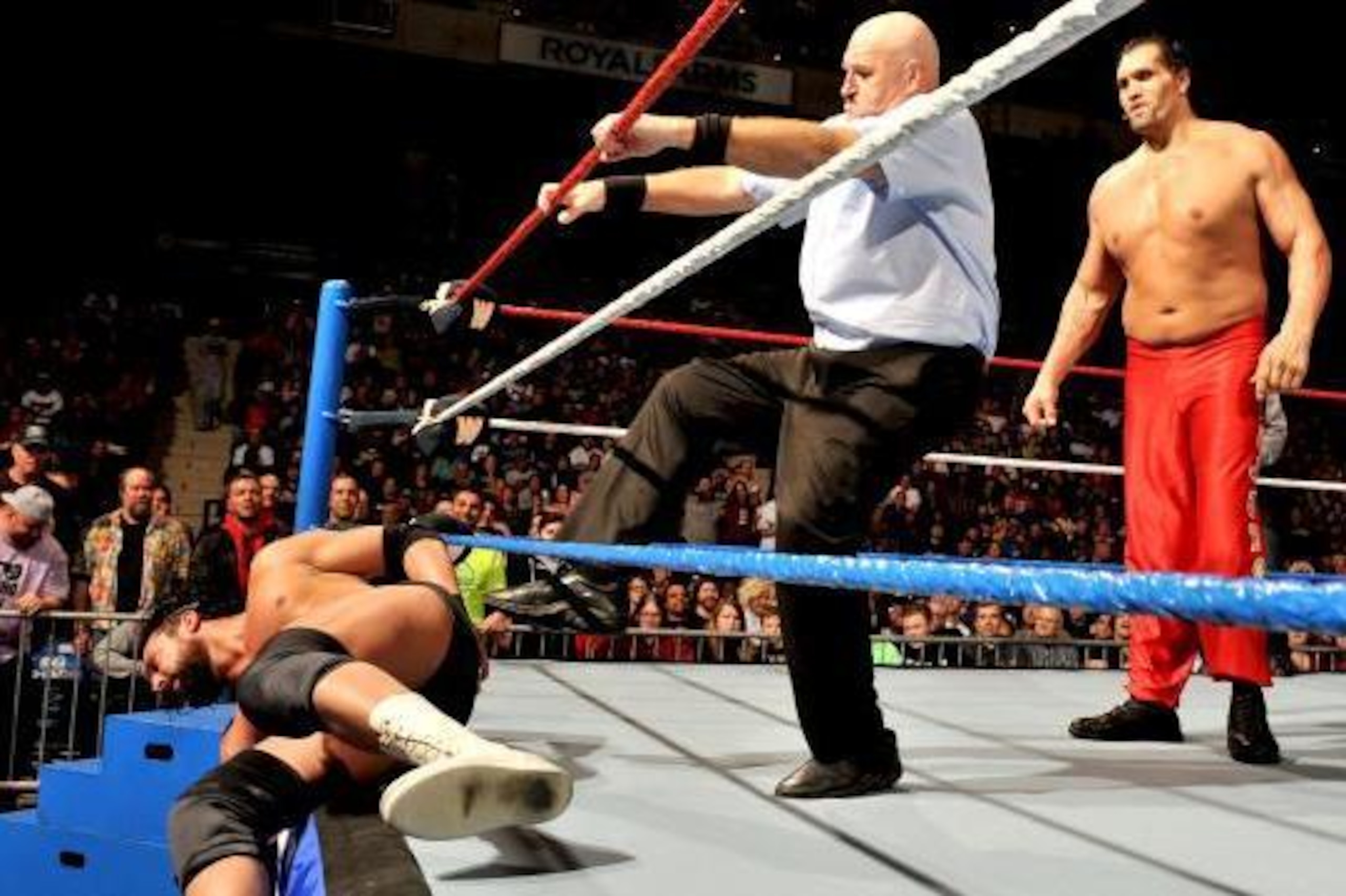 Sandow being pushed out by Sgt. Slaughter