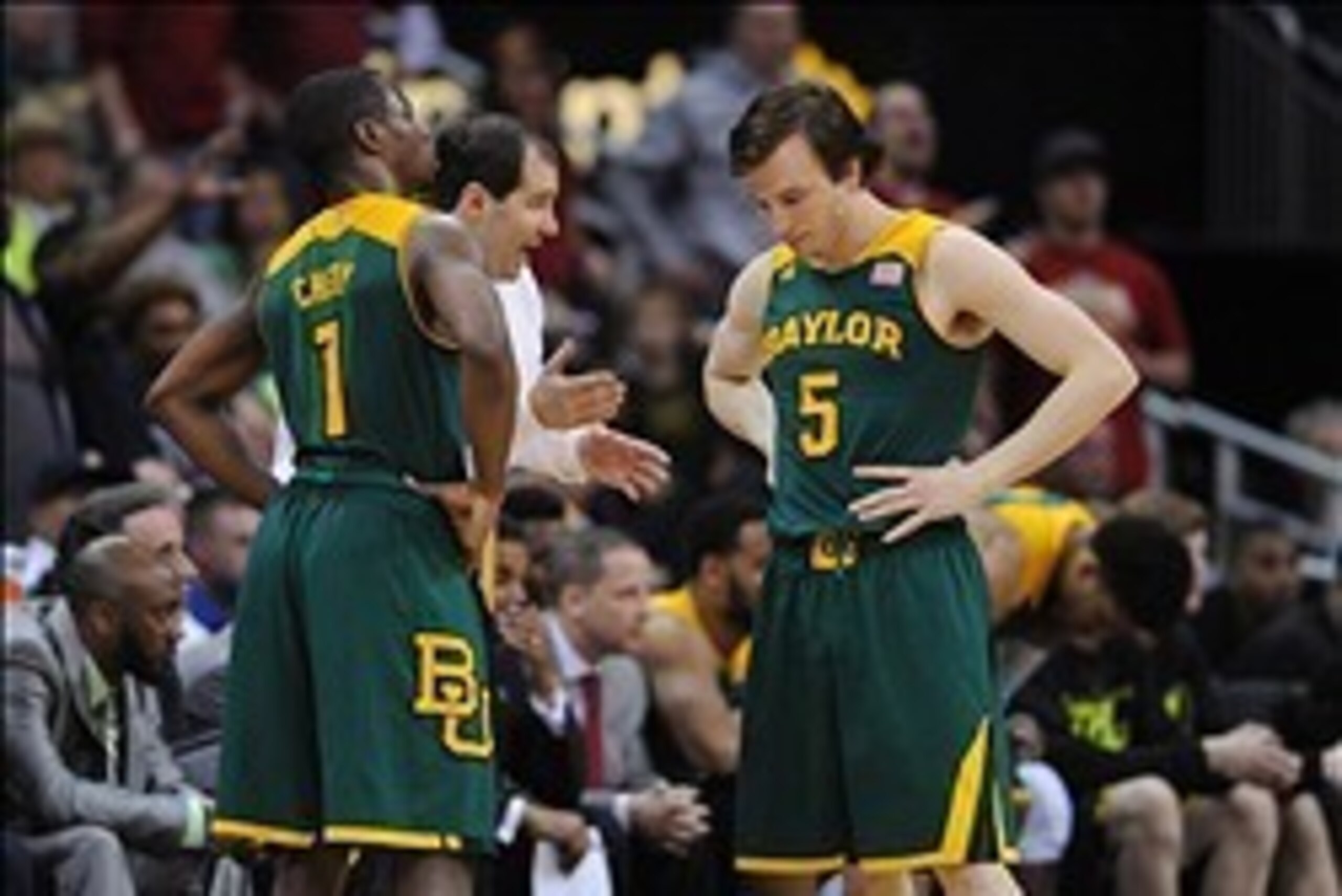 Mar 15, 2014; Kansas City, MO, USA; Baylor Bears head coach Scott Drew talks with guard Kenny Chery (1) and guard Brady Heslip (5) during the second half against the Iowa State Cyclones in the championship game of the Big 12 Conference college basketball 
