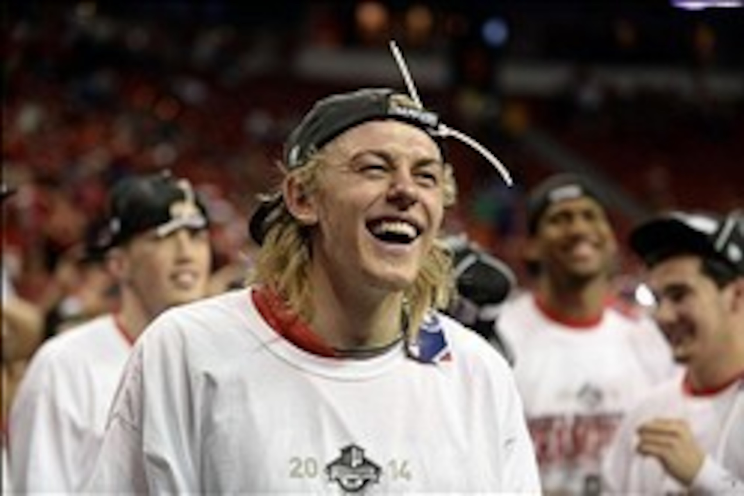 Mar 15, 2014; Las Vegas, NV, USA; New Mexico Lobos guard Hugh Greenwood (3) reacts following the win against the San Diego State Aztecs in the championship game for the Mountain West Conference college basketball tournament at Thomas and Mack Center. The 