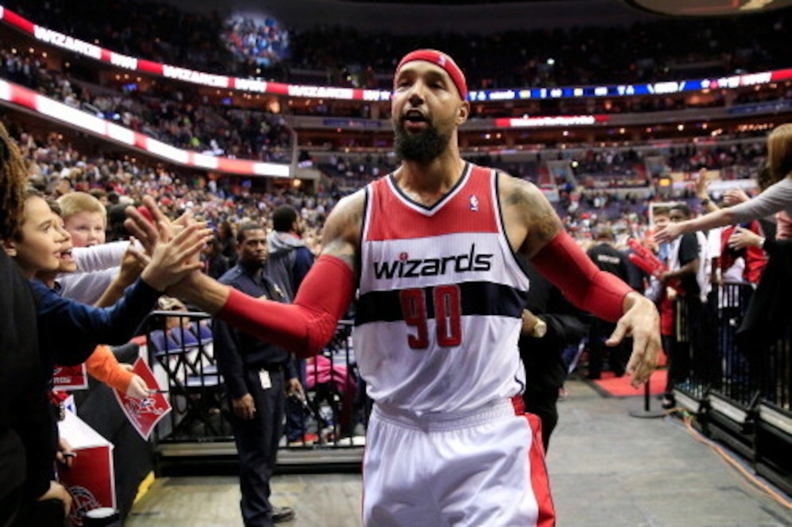 WASHINGTON, DC - MARCH 15: Drew Gooden #90 of the Washington Wizards greets fans following the Wizards 101-94 win over the Brooklyn Nets at Verizon Center on March 15, 2014 in Washington, DC. NOTE TO USER: User expressly acknowledges and agrees that, by d WASHINGTON, DC - MARCH 15: Drew Gooden #90 of the Washington Wizards greets fans following the Wizards 101-94 win over the Brooklyn Nets at Verizon Center on March 15, 2014 in Washington, DC. NOTE TO USER: User expressly acknowledges and agrees that, by d