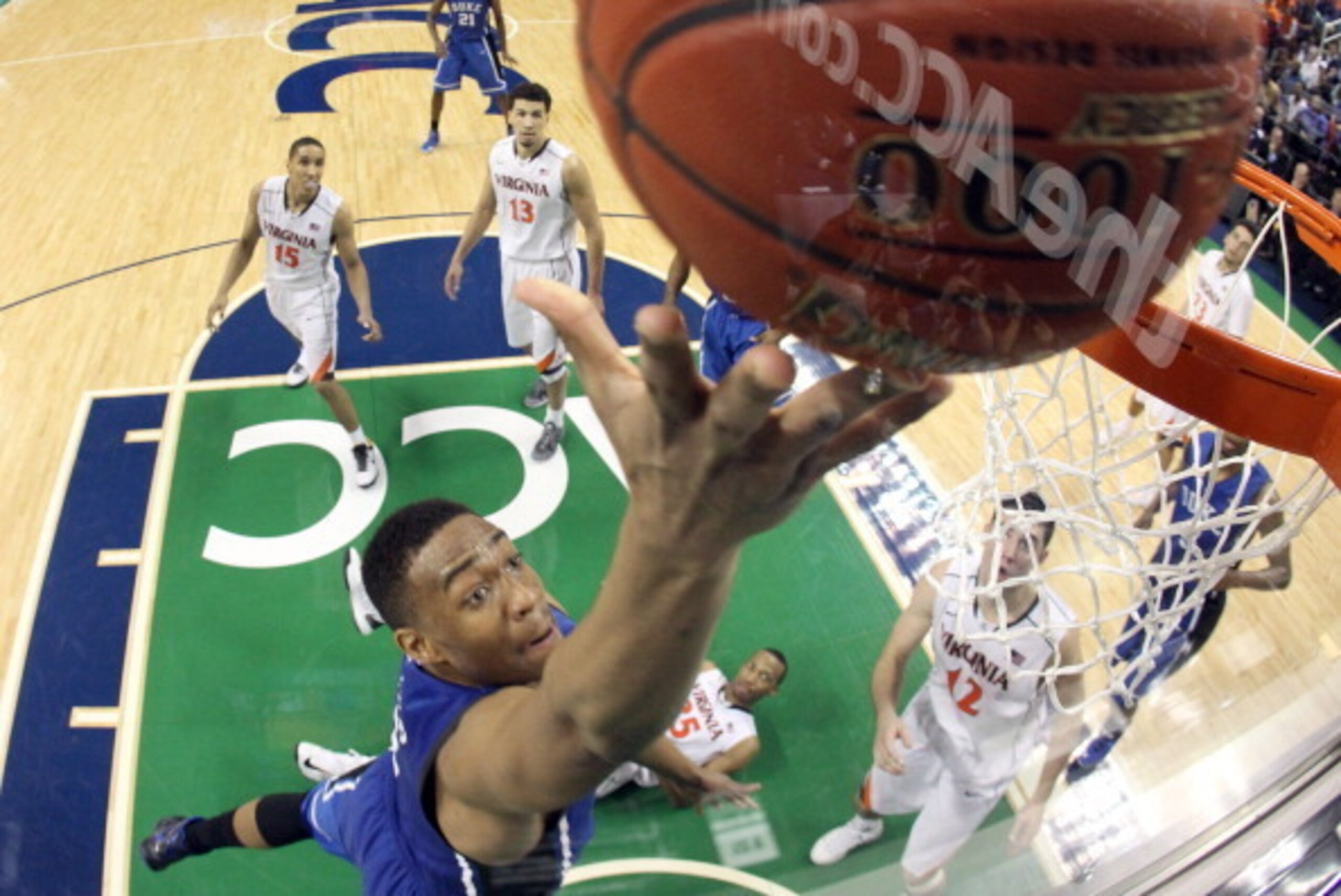 GREENSBORO, NC - MARCH 16:  Jabari Parker #1 of the Duke Blue Devils goes up for a shot against the Virginia Cavaliers during the finals of the 2014 Men's ACC Basketball Tournament at Greensboro Coliseum on March 16, 2014 in Greensboro, North Carolina.  (