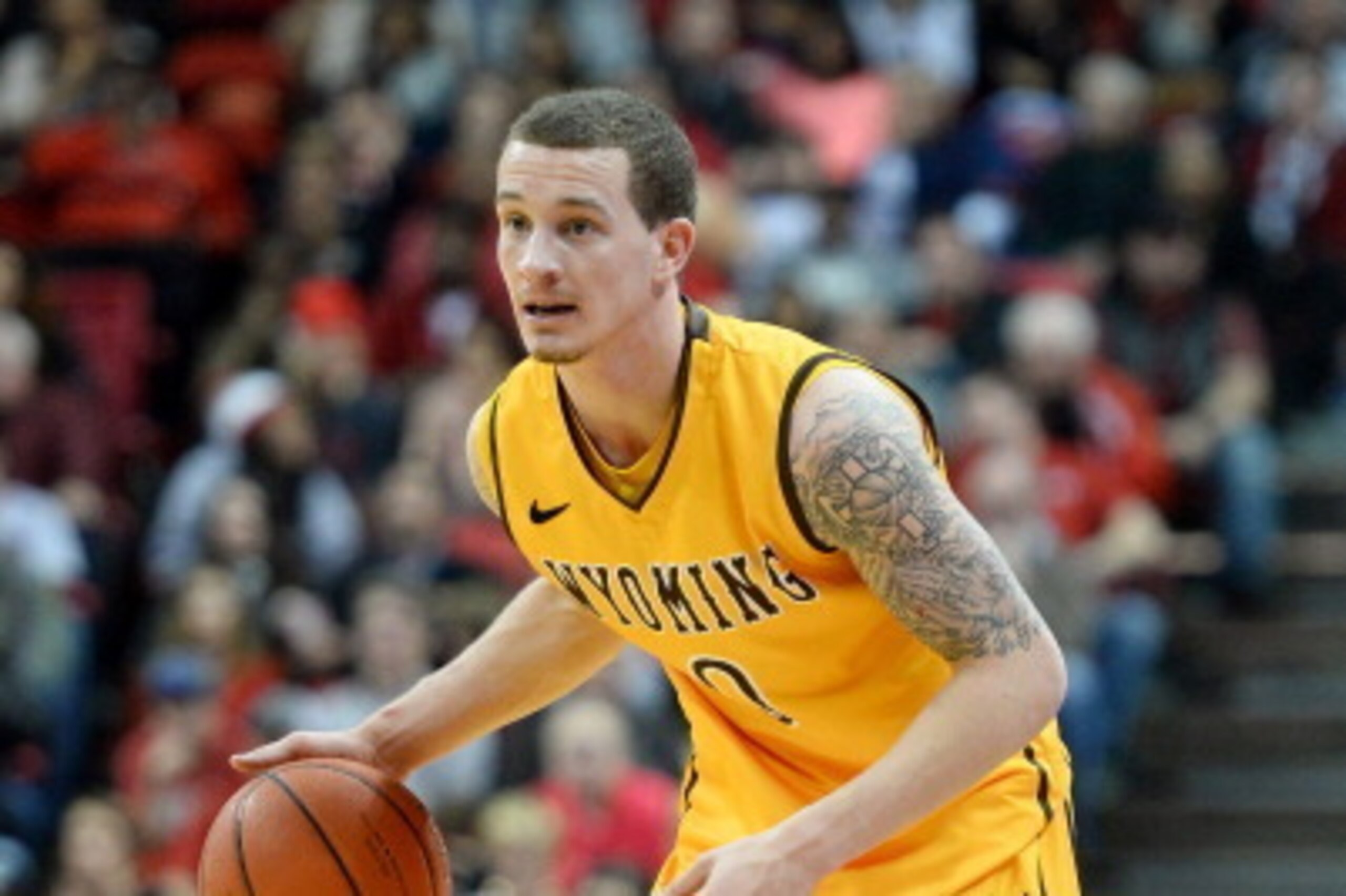 LAS VEGAS, NV - FEBRUARY 08: Josh Adams #0 of the Wyoming Cowboys brings the ball up the court against the UNLV Rebels during their game at the Thomas & Mack Center on February 8, 2014 in Las Vegas, Nevada. UNLV won 48-46. (Photo by Ethan Miller/Getty I LAS VEGAS, NV - FEBRUARY 08: Josh Adams #0 of the Wyoming Cowboys brings the ball up the court against the UNLV Rebels during their game at the Thomas & Mack Center on February 8, 2014 in Las Vegas, Nevada. UNLV won 48-46. (Photo by Ethan Miller/Getty I
