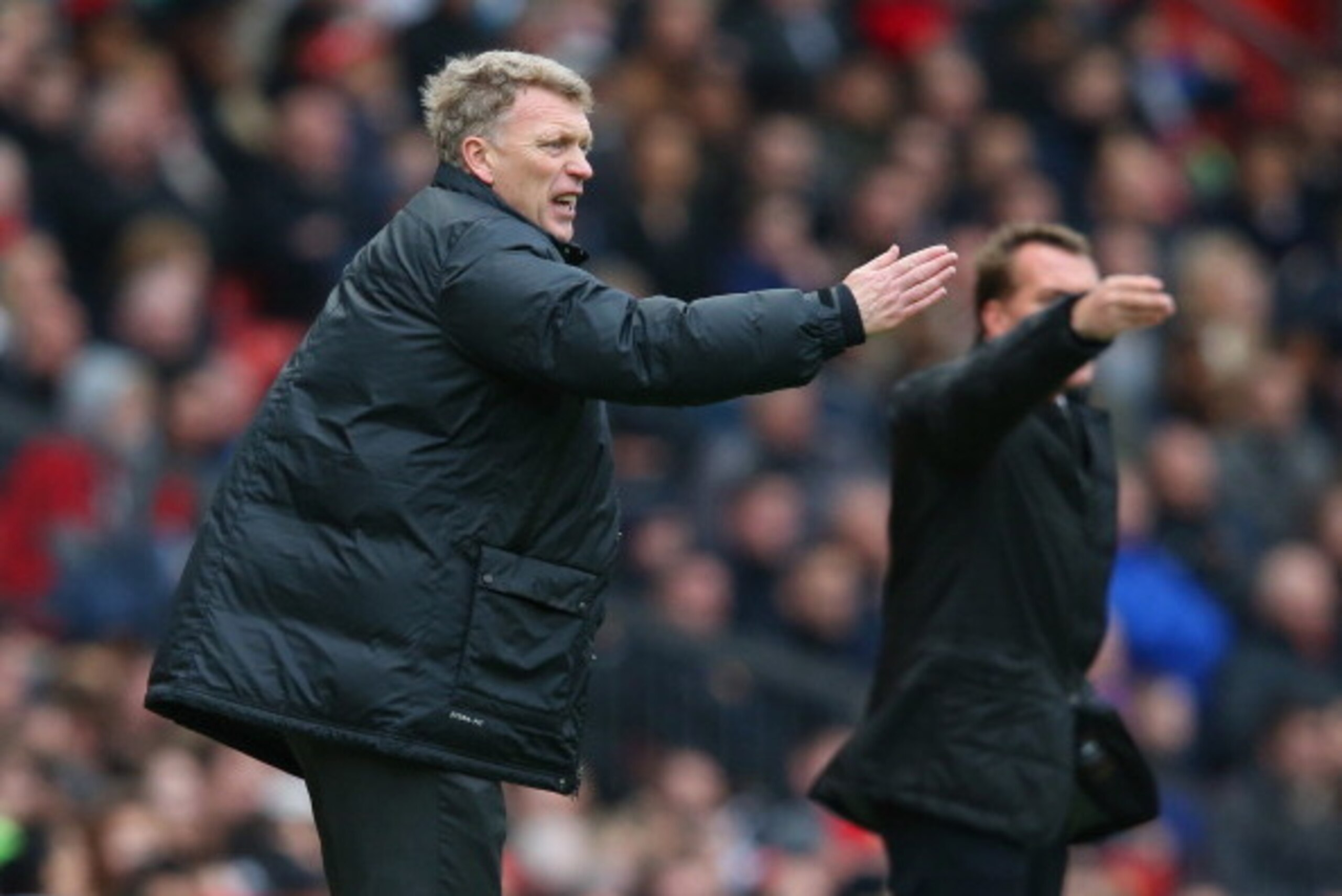 MANCHESTER, ENGLAND - MARCH 16:  Manchester United Manager David Moyes reacts during the Barclays Premier League match between Manchester United and Liverpool at Old Trafford on March 16, 2014 in Manchester, England.  (Photo by Alex Livesey/Getty Images)