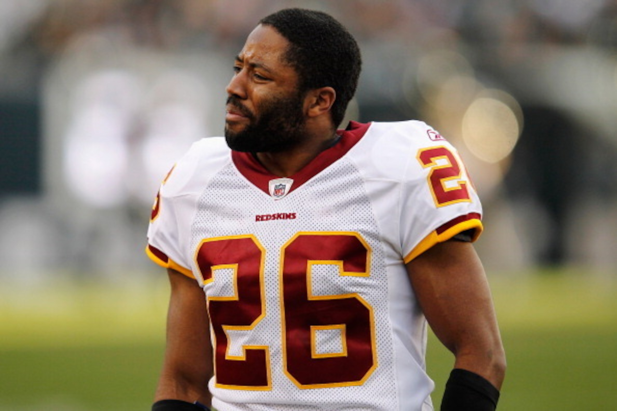 PHILADELPHIA, PA - JANUARY 01:  Josh Wilson #26 of the Washington Redskins walks off the field against the Philadelphia Eagles at Lincoln Financial Field on January 1, 2012 in Philadelphia, Pennsylvania.  (Photo by Rob Carr/Getty Images)
