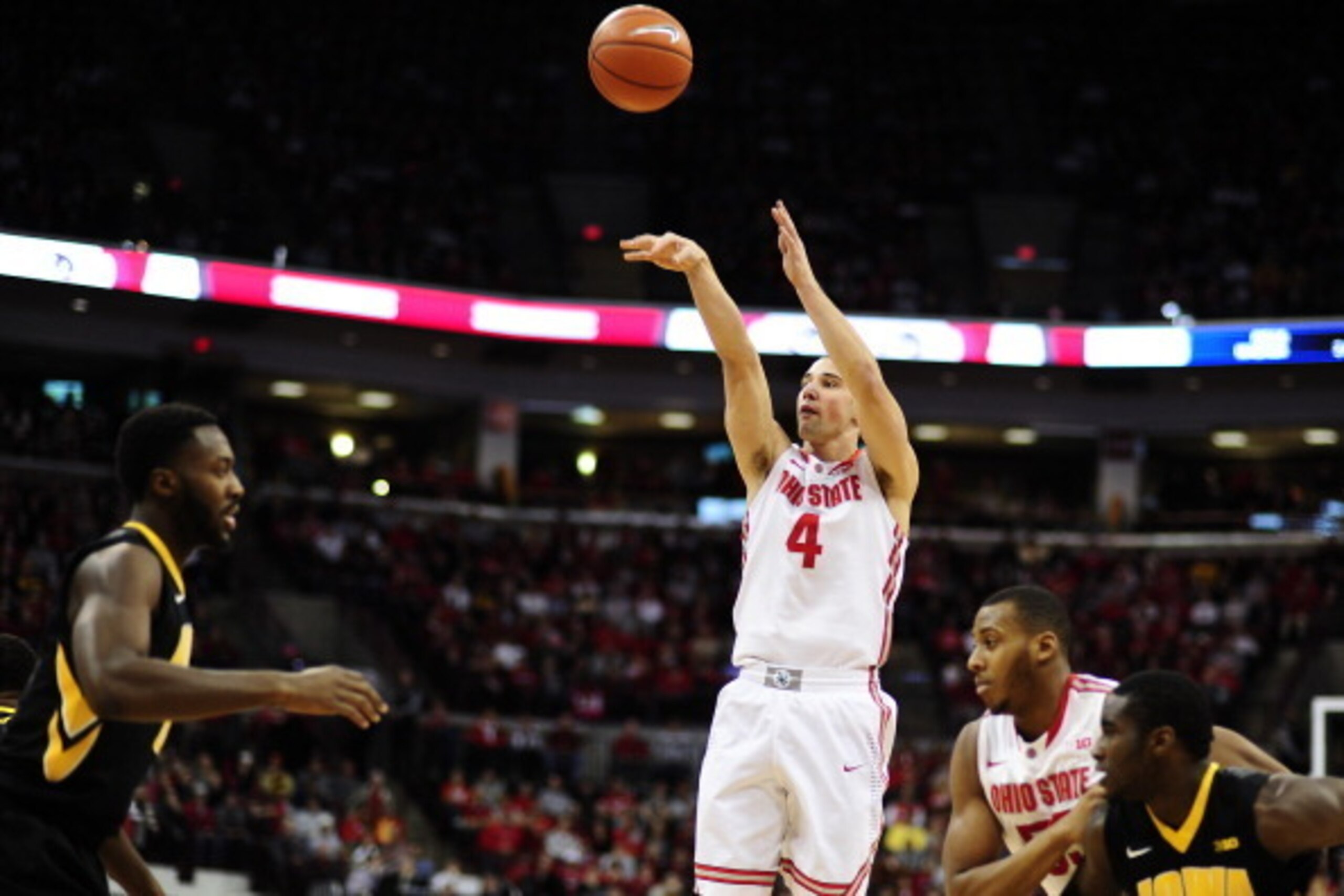 COLUMBUS, OH - JANUARY 12:  Aaron Craft #4 of the Ohio State Buckeyes shoots a jump shot agains the Iowa Hawkeyes on January 12, 2014 at Value City Arena in Columbus, Ohio.   (Photo by Ryan Young/Getty Images)