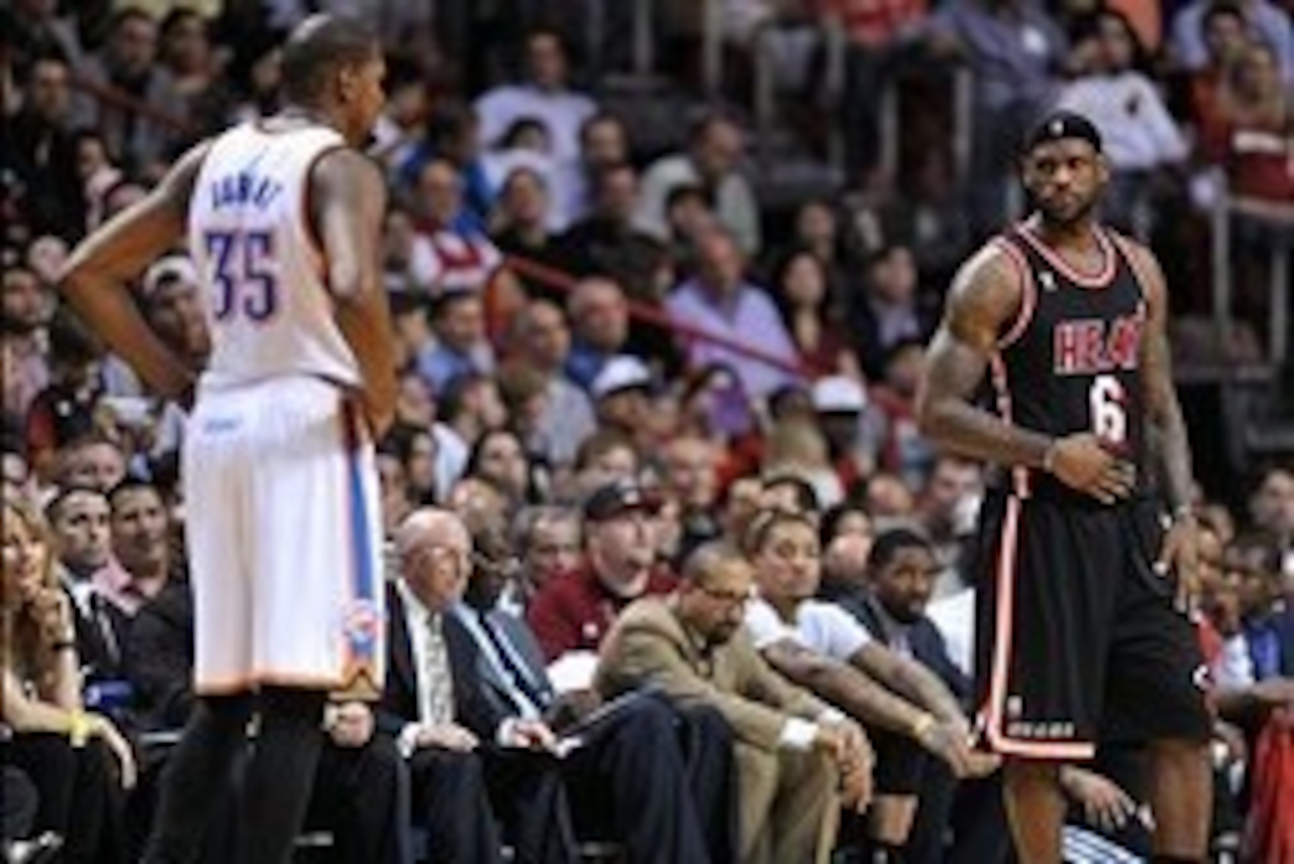 Jan 29, 2014; Miami, FL, USA; Miami Heat small forward LeBron James (6) looks over Oklahoma City Thunder small forward Kevin Durant (35) during the second half at American Airlines Arena. Mandatory Credit: Steve Mitchell-USA TODAY Sports