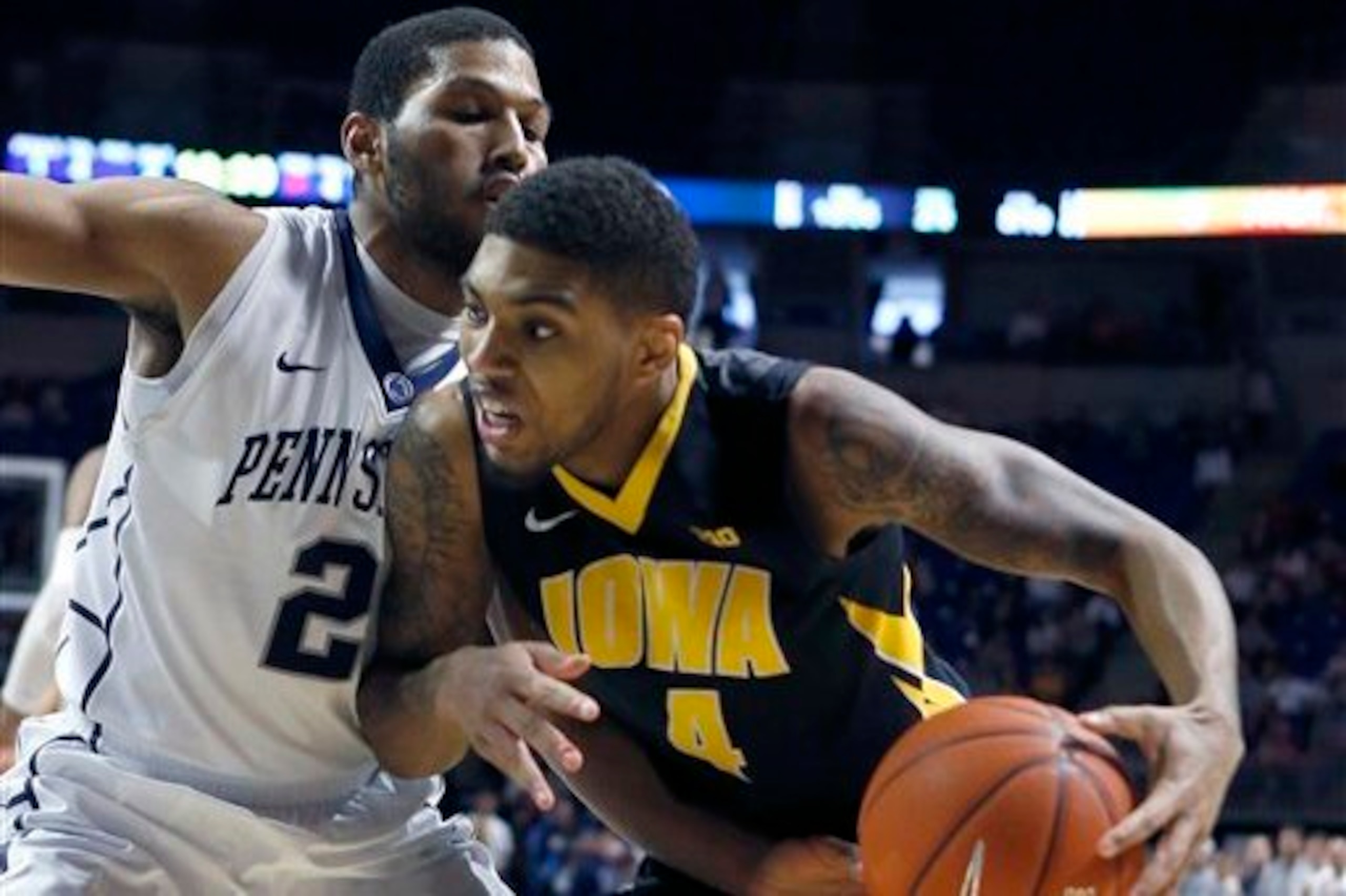 Can Devyn Marble (right) do enough to help the Hawkeyes advance?