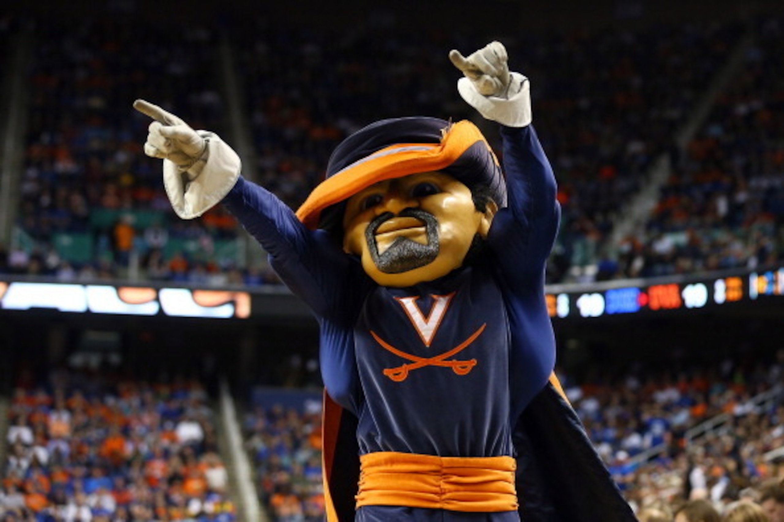 GREENSBORO, NC - MARCH 16:  The Virginia Cavaliers mascot tries to rally their fans during their game against the Duke Blue Devils in the finals of the 2014 Men's ACC Basketball Tournament at Greensboro Coliseum on March 16, 2014 in Greensboro, North Caro