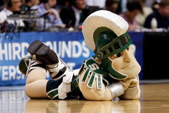 AUBURN HILLS, MI - MARCH 21:  Sparty, the mascot for the Michigan State Spartans performs against the Valparaiso Crusaders during the second round of the 2013 NCAA Men's Basketball Tournament at at The Palace of Auburn Hills on March 21, 2013 in Auburn Hi