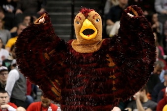 NEW YORK, NY - MARCH 16: The Saint Joseph's Hawks mascot walks on the court during a stoppage against the Virginia Commonwealth Rams during the Championship game of the 2014 Atlantic 10 Men's Basketball Tournament at Barclays Center on March 16, 2014 in t