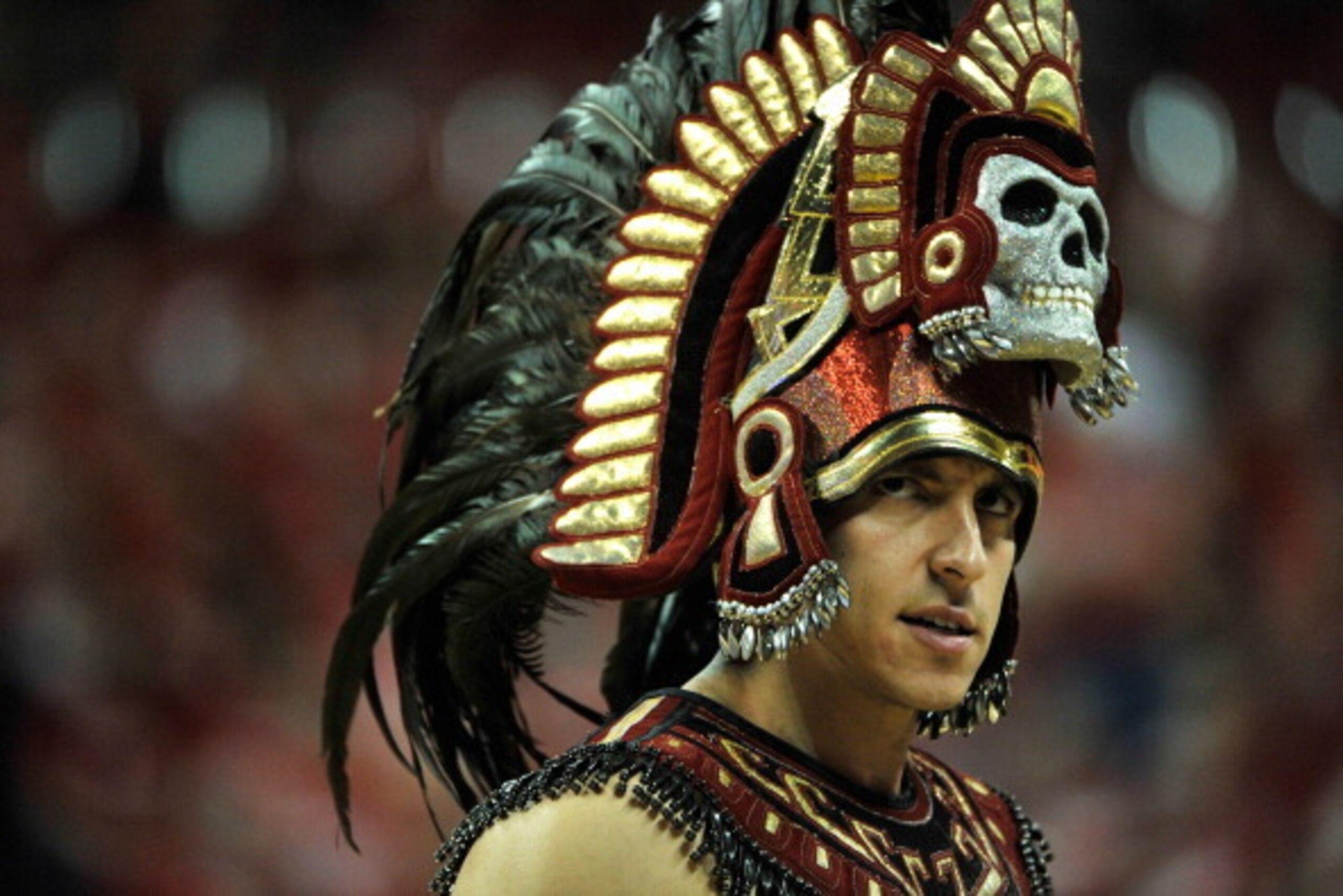 LAS VEGAS, NV - MARCH 15:  San Diego State Aztecs mascot Aztec Warrior appears on the court during the first half of a semifinal game of the Reese's Mountain West Conference Basketball tournament against the New Mexico Lobos at the Thomas & Mack Center on
